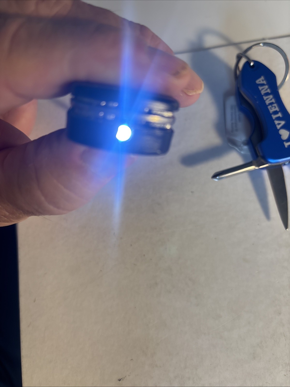 Pocket multitool with flashlight 2 In The Lot