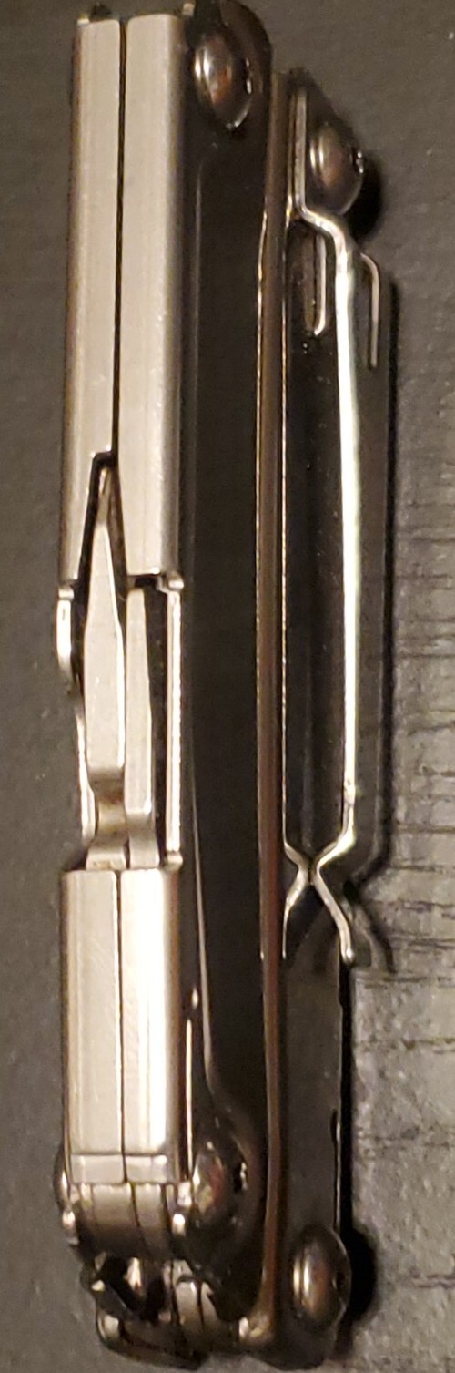 LEATHERMAN REV MULTI-TOOL IS IN MINT CONDITION 024
