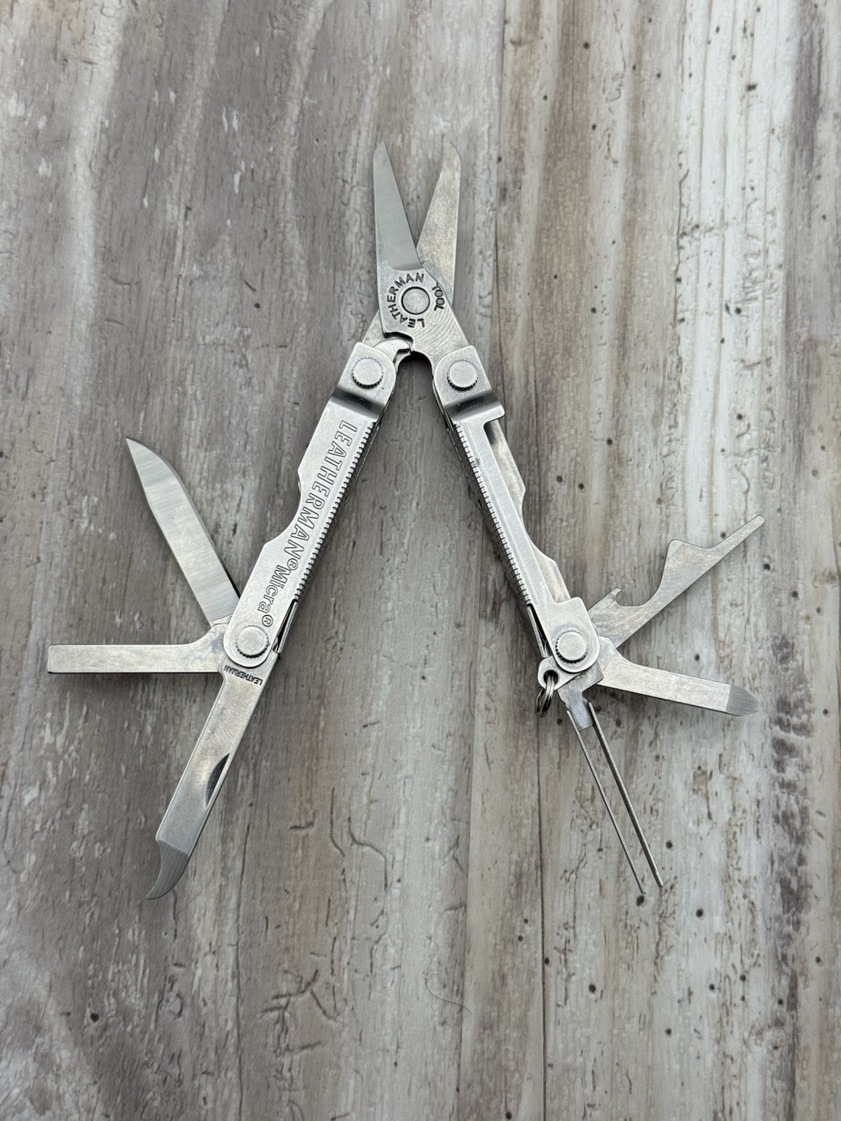 Leatherman Micra Multi-Tool Knife Scissors Key Ring Stainless Lexus logo