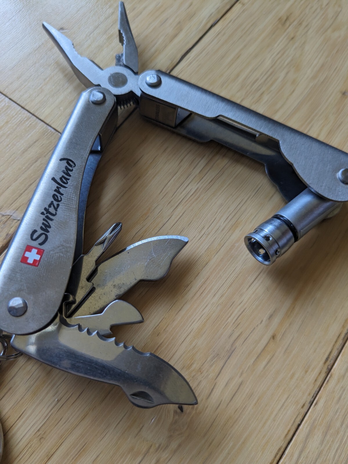 Swiss-Made Foldable Pocket Multi-Tool Stainless Steel w Pocket Clip. 8 Functions