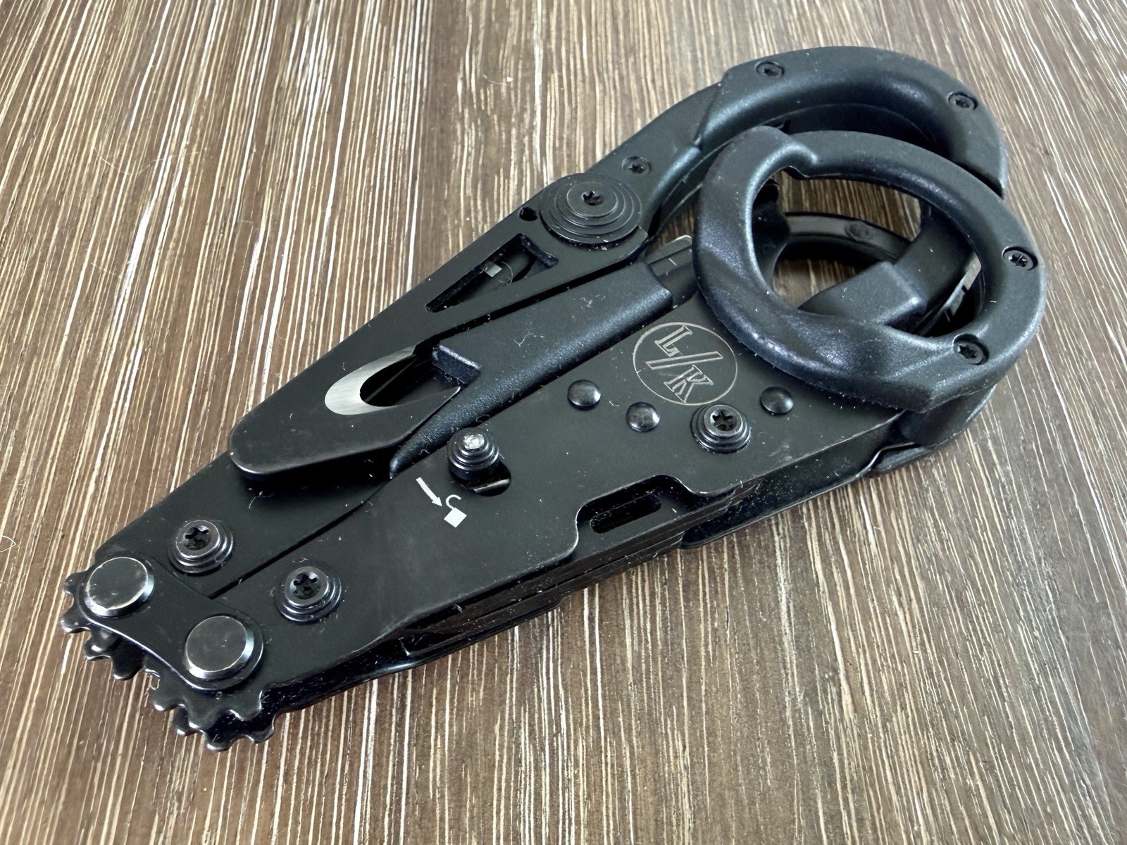SOG ParaShears tactical emergency shears with a black oxide finish.
