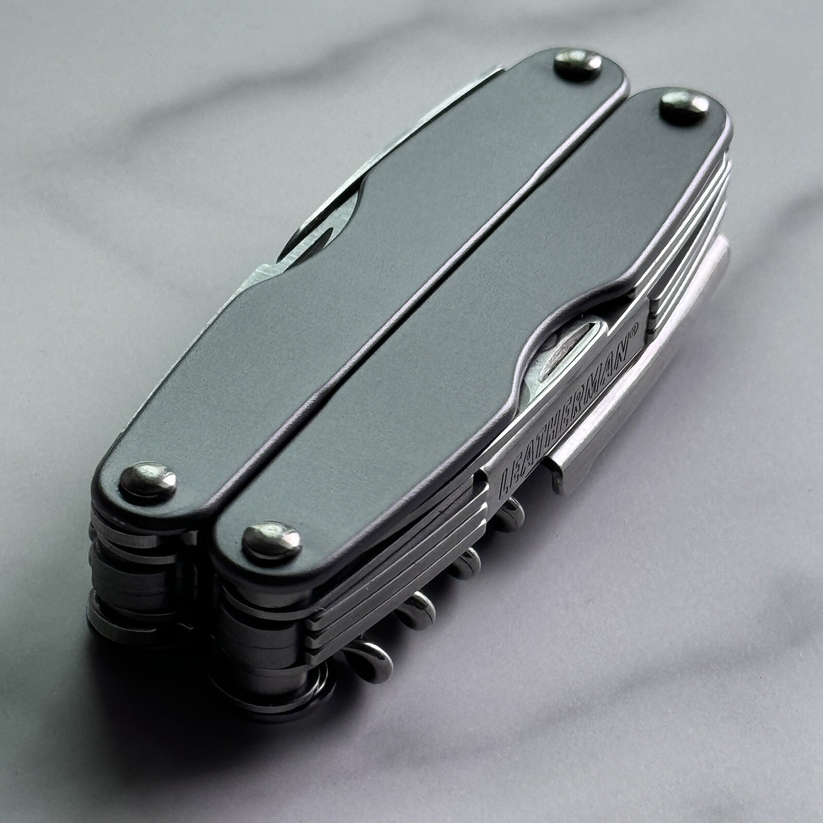 New, Early Leatherman Juice CS4 Storm Gray multitool.