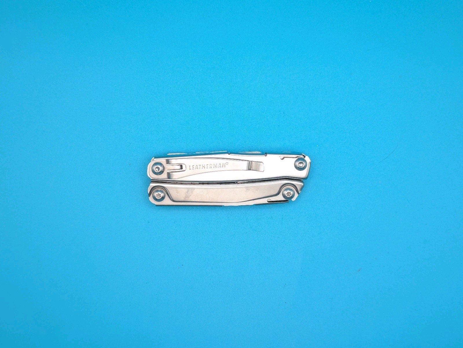 Leatherman Rev 3.8″ Multi-Tool, Stainless! *SOME RUST ON ITEM*