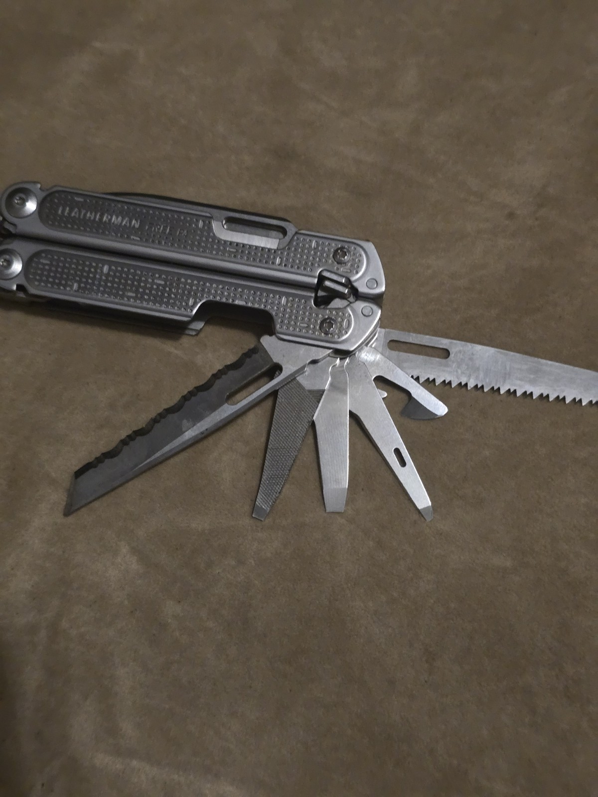 Retired Leatherman Free P4 Multi-Tool With Sheath and Donk Titanium Pocket Clip