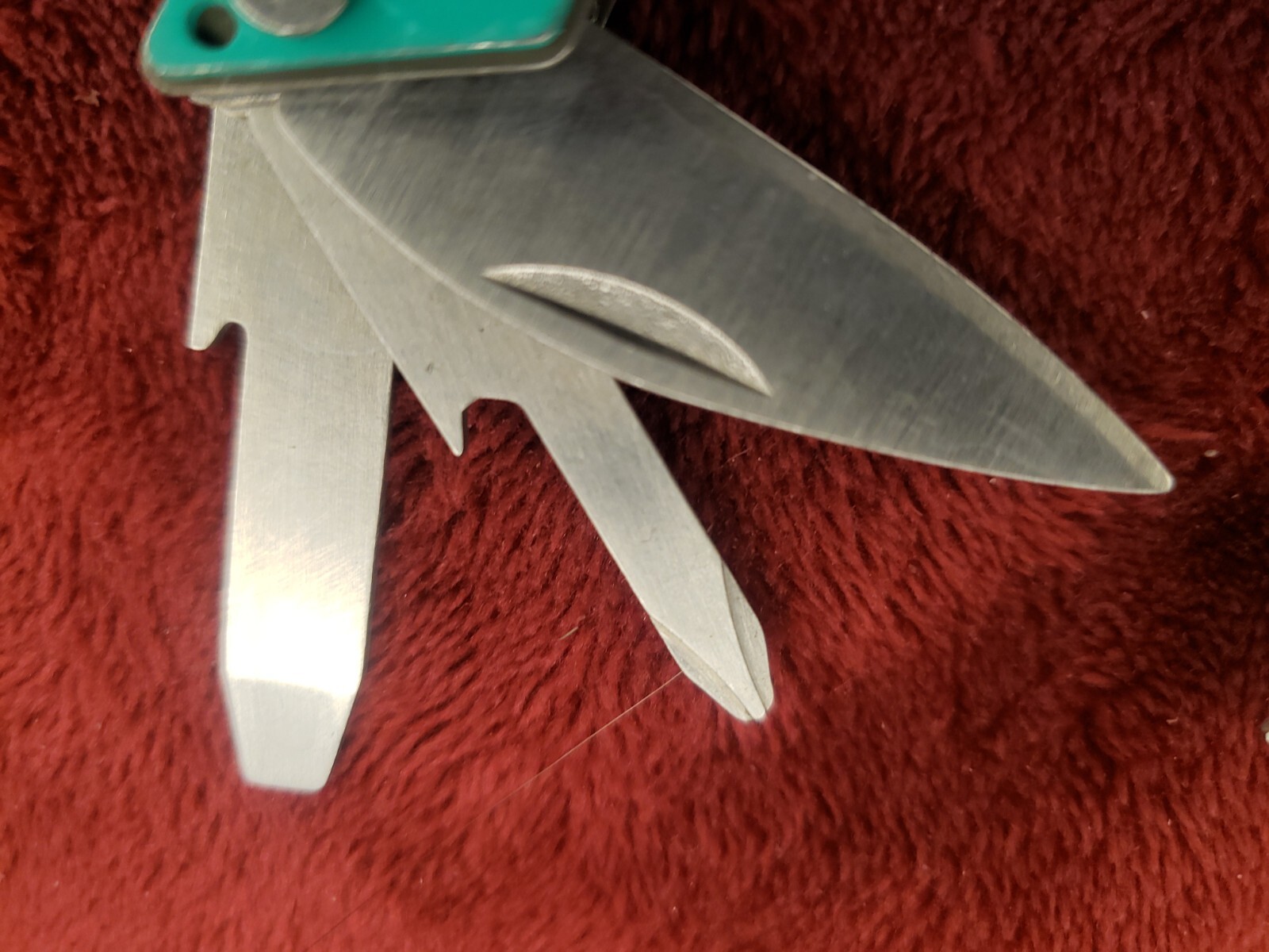 Lot of three Cabela’s Multi Tool Stainless Clear, Teal Green & Red