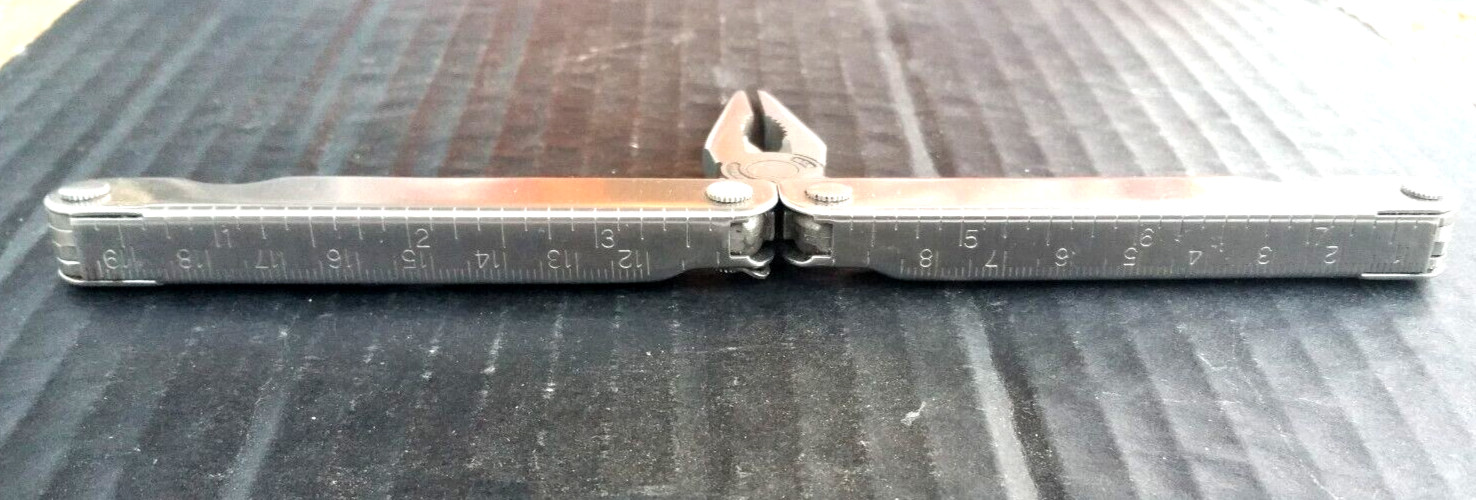 Leatherman Multi Twelve Tool Stainless 4″ No Sheath 2.5″ Blade Excellent + 1985