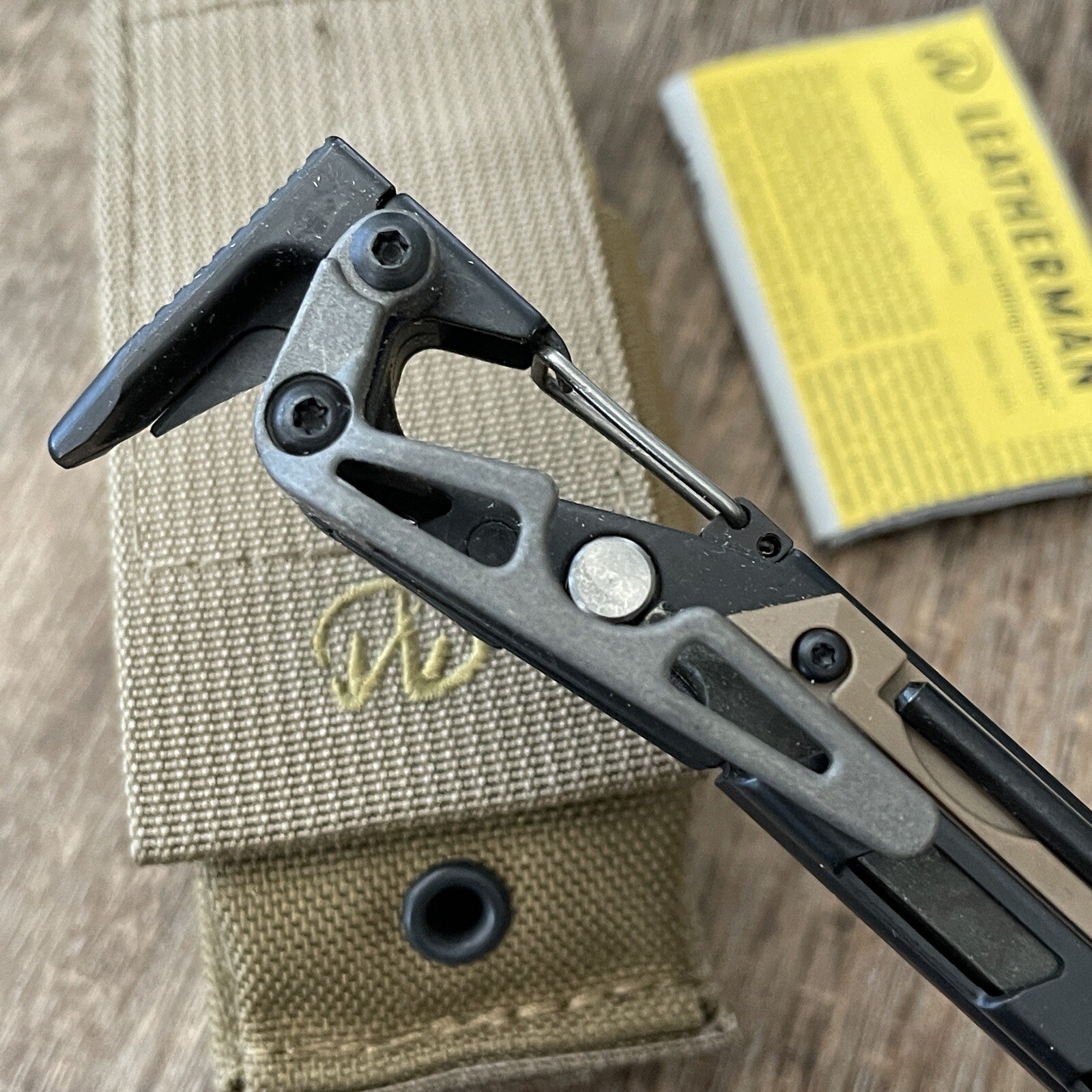Leatherman MUT Black w/Titanium Clip multi tool, brown sheath. Made 12/2012