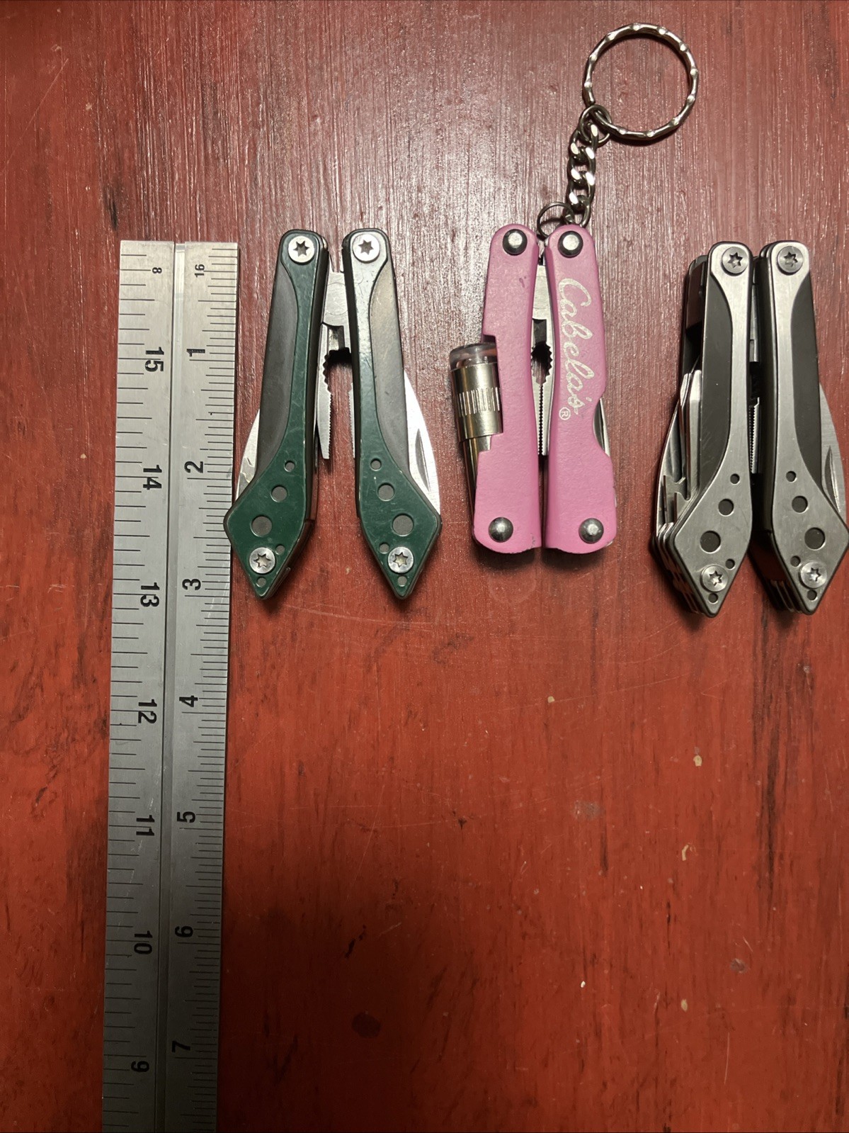 Lot Of 3 Cabela’s Green, Silver And Pink Mini Multi-Tools Spring Asst