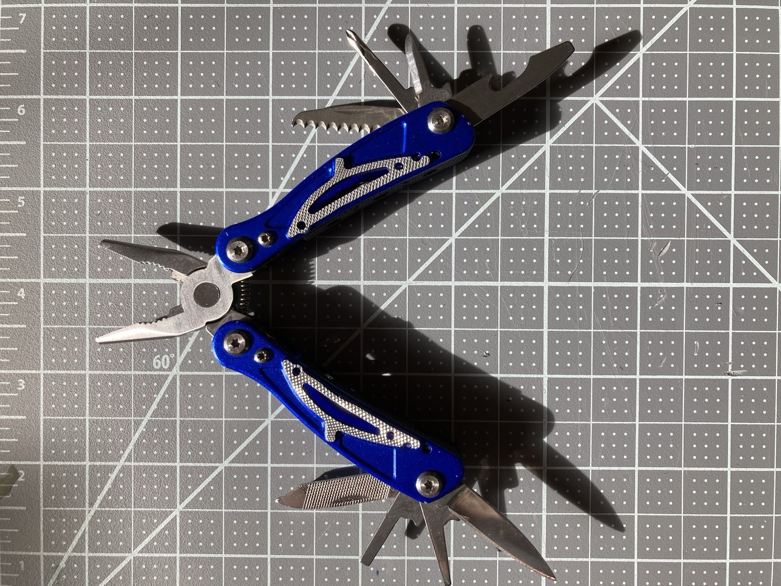 PT Multitool Pliers Spring-Loaded Pocket- Sized Blue