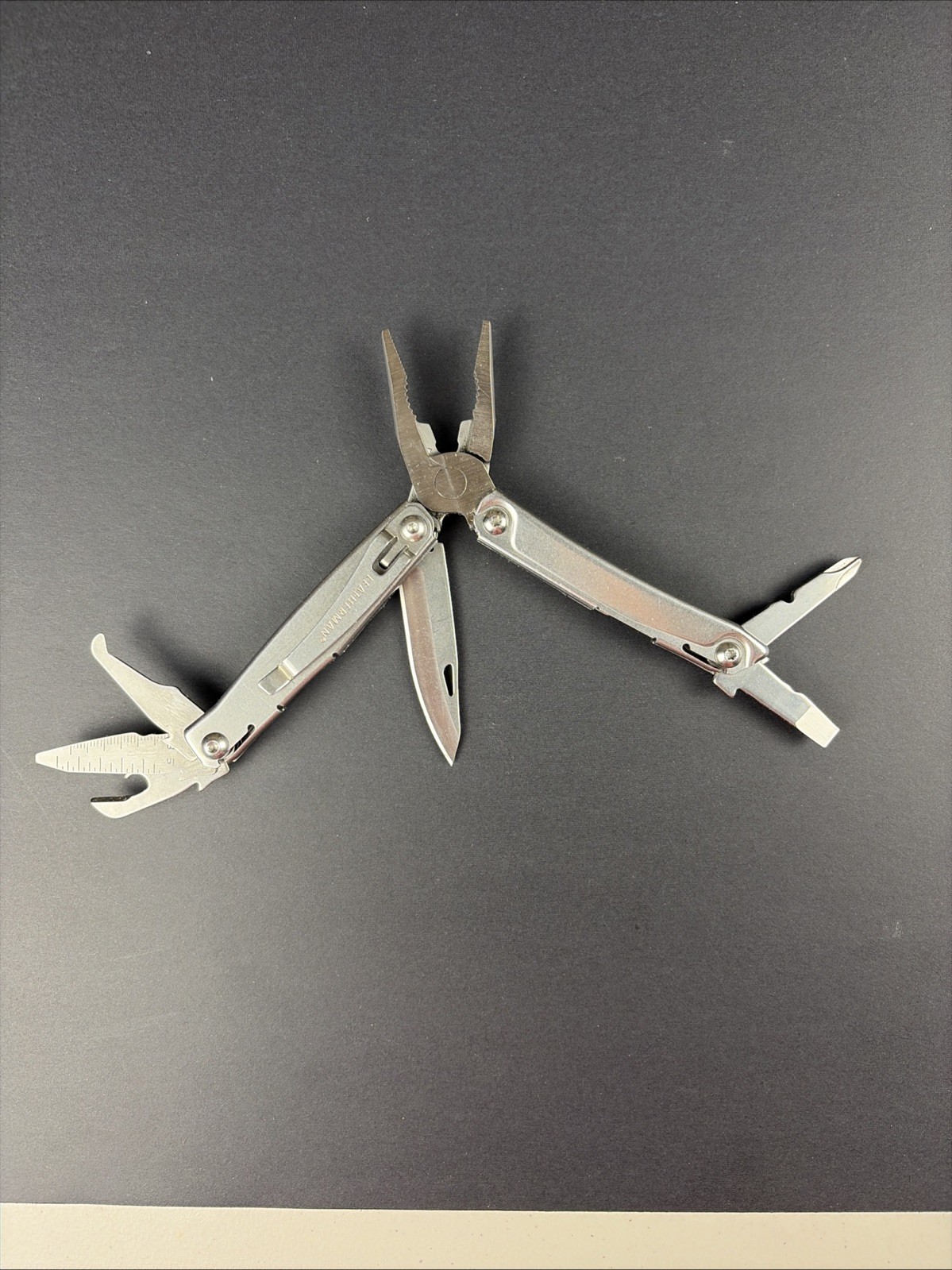 Leatherman Rev 3.8″ Multi-Tool, Stainless! USED
