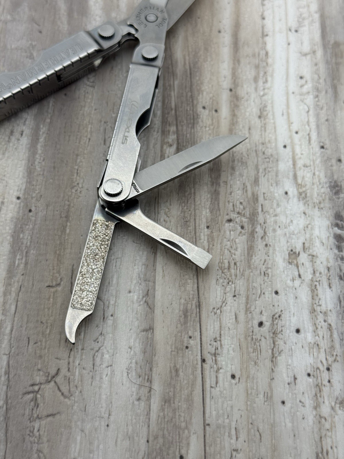 Leatherman Micra Multi-Tool Knife Scissors Key Ring Stainless Lexus logo