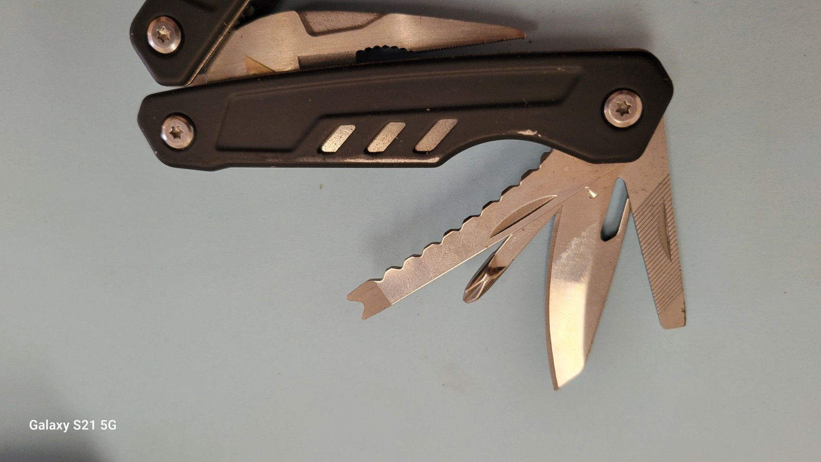 10 in 1 Stainless Steel Mini Multi-Purpose Tool with Nylon Pouch Camping Hunting