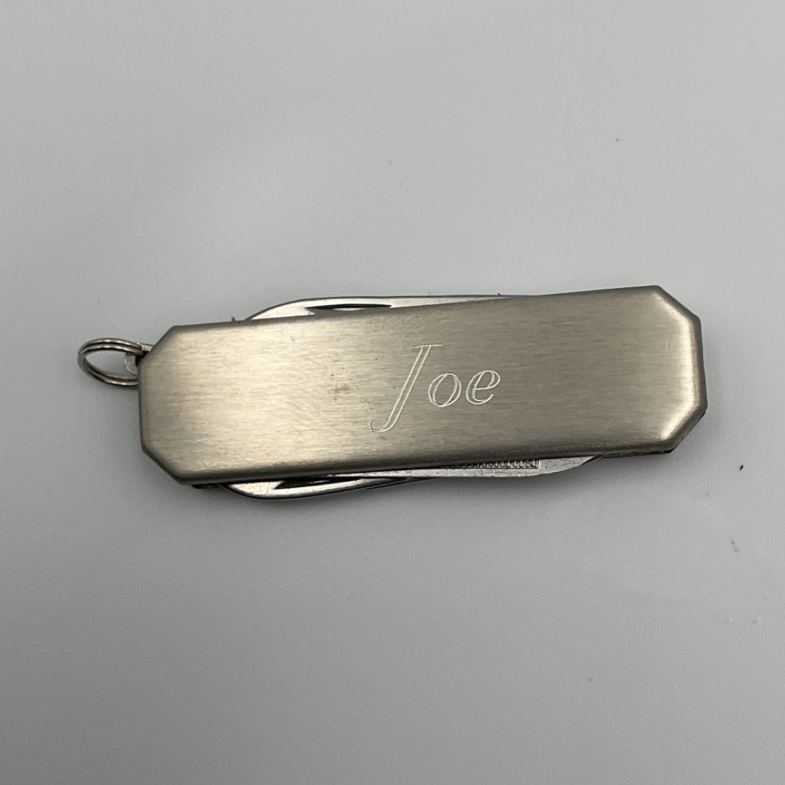 Silver Stainless Steel Multi-Tool Knife, Scissors, File, Screwdriver Pocket Tool
