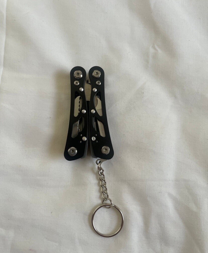 Pocket Size Multitool with Spring-Action Pliers and Saw,