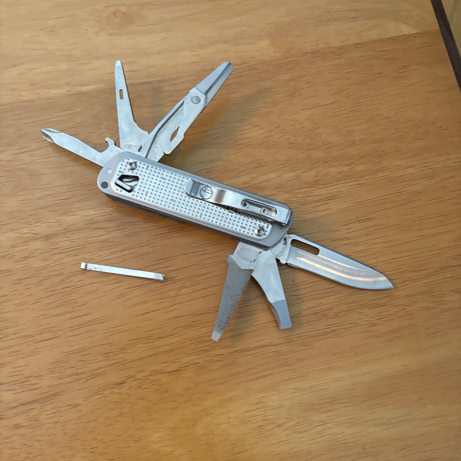 Leatherman FREE T4 Pocket Knife Multi-tool! Stainless! RETIRED!