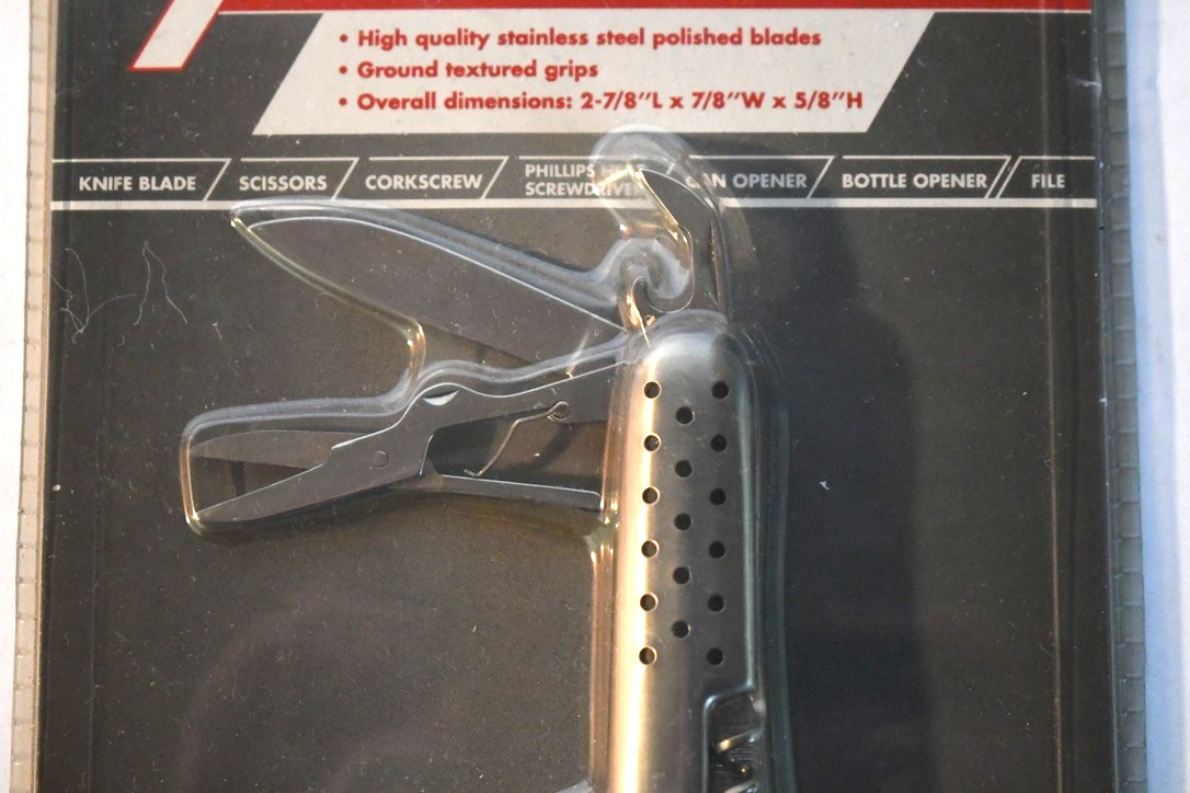 NIP 7 Function Pocket Knife Tools Stainless Steel Ground Textured Grips 90733