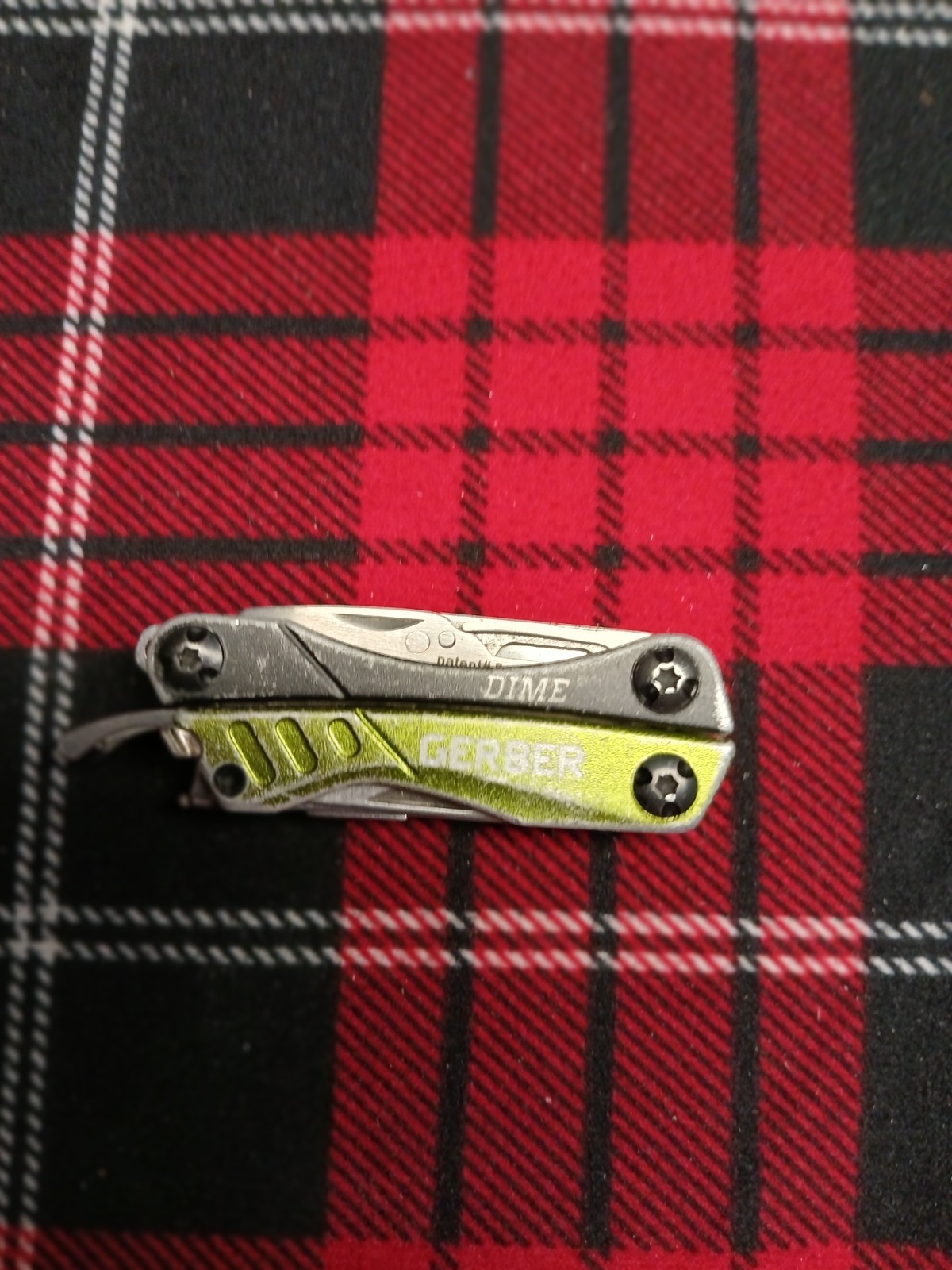 Gerber Green Dime has wear outside. Inside great!