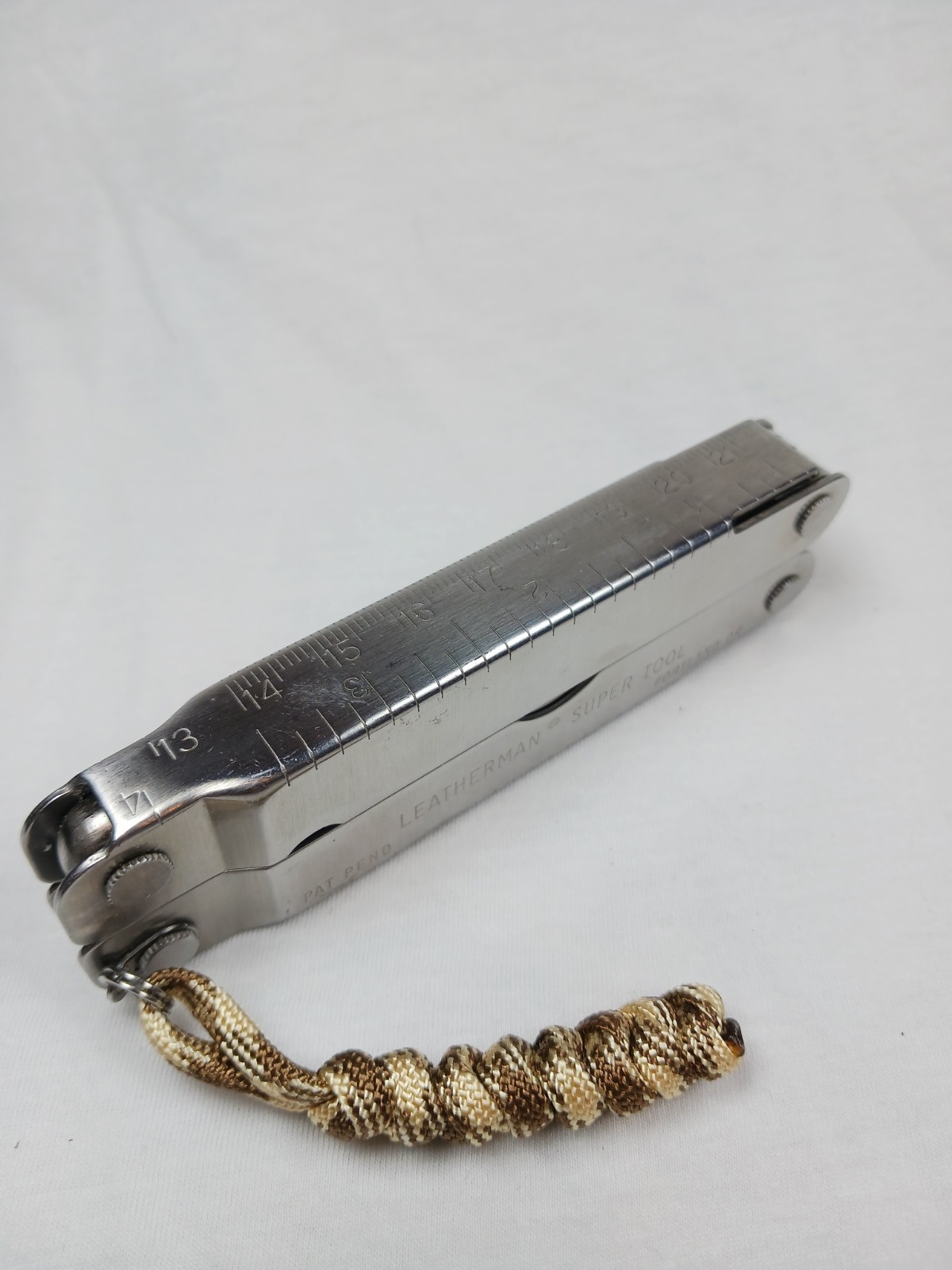 Leatherman Super Tool 100L 12-in-1 Stainless Multi-Tool Part Serrated w/ Sheath