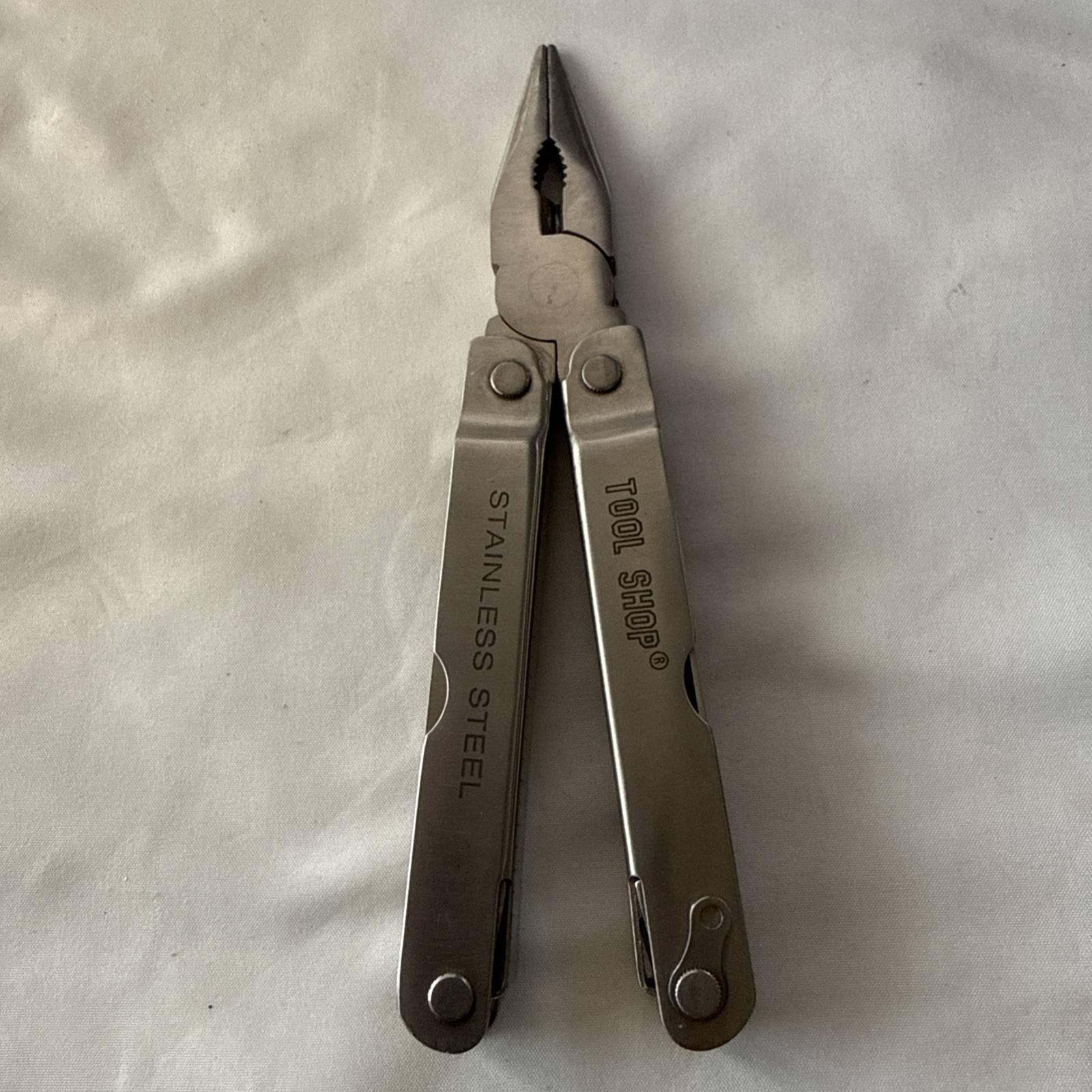 Tool Shop, multitool 13 tools plus!!! Nice tool!!! Not branded Stainless Steel