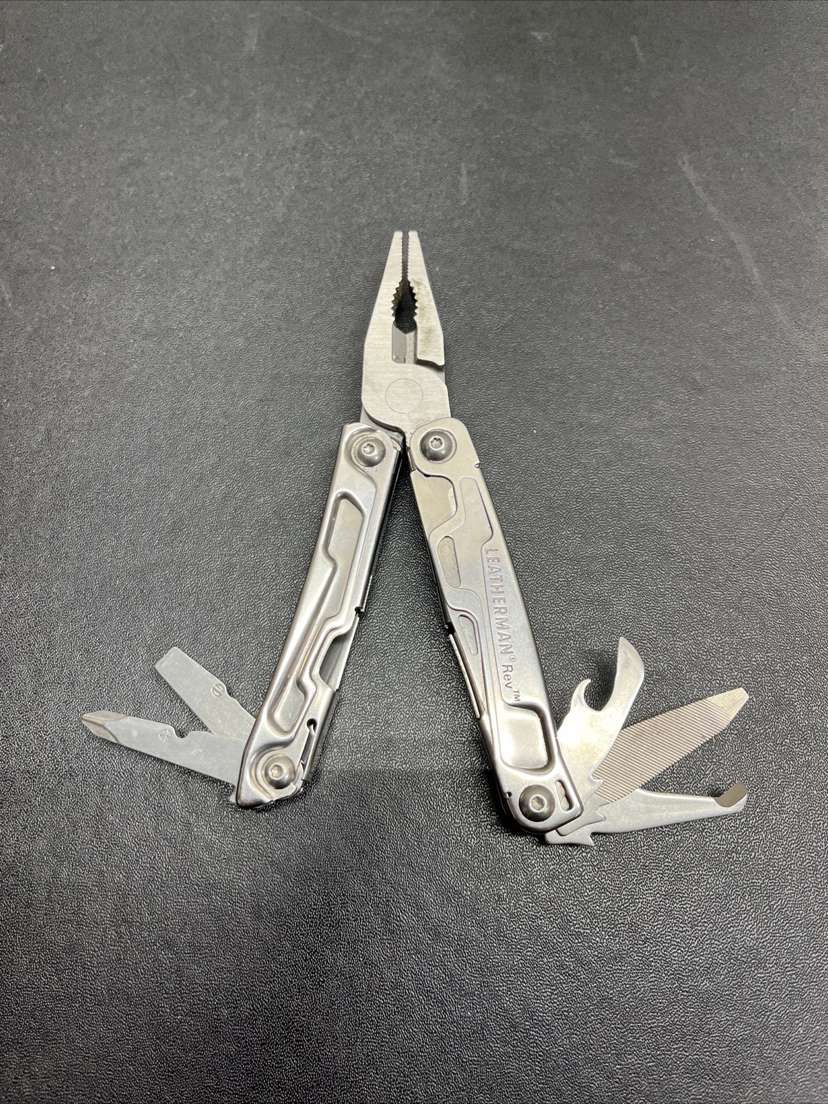 Leatherman Rev Pocket Size Carry-on Stainless Steel Multi-tool, & Engraved