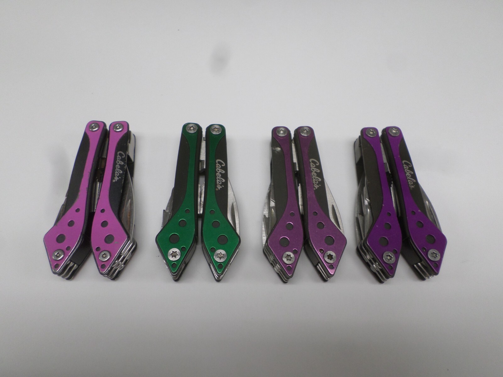 Lot of 4 Cabela’s Mini Multi Tools Spring Open Needle Nose Pliers Scissors Saw