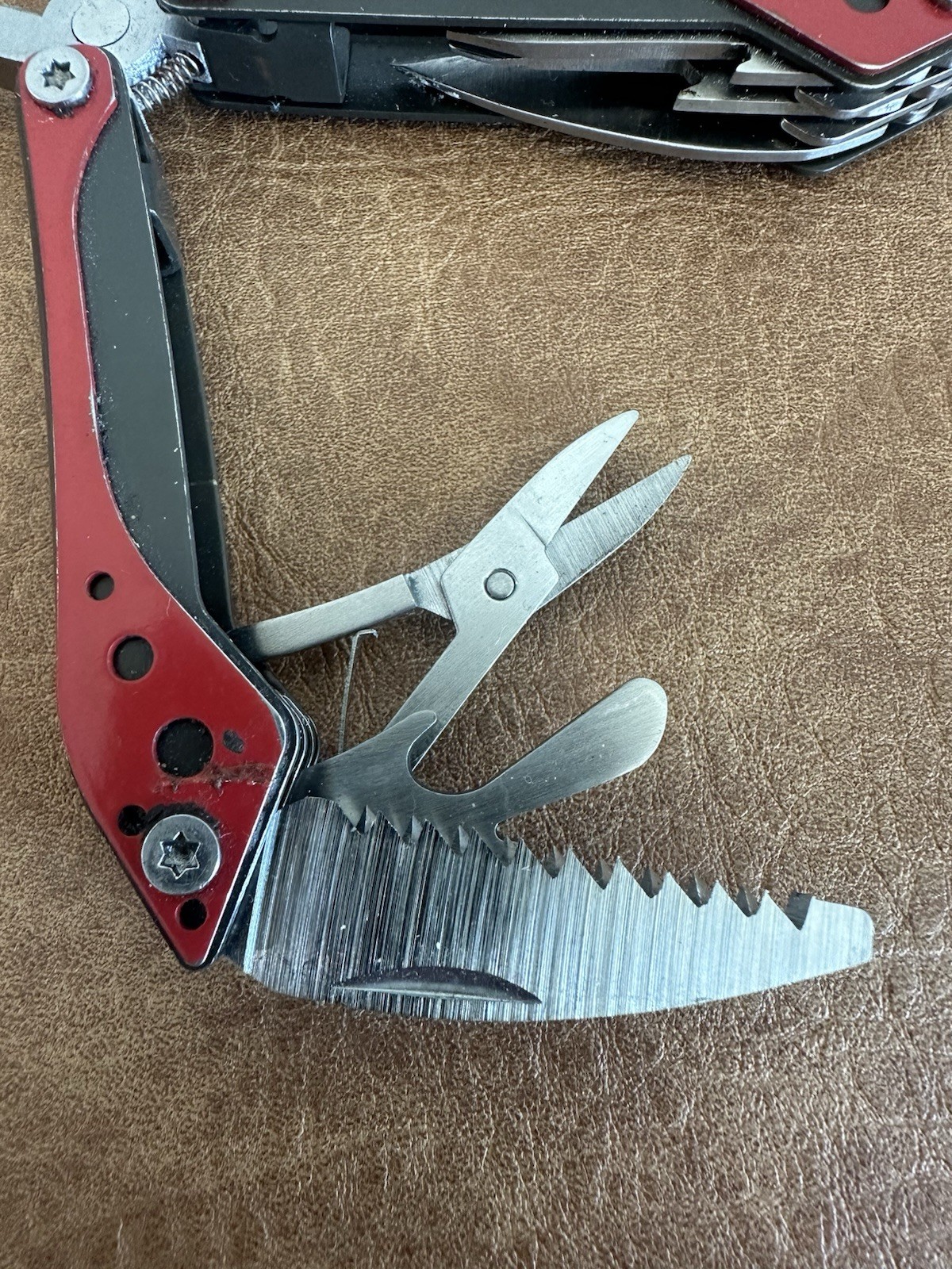 Cabela’s 4-1/2″ Multi-Tool in Red and Black with 7 Tools In One