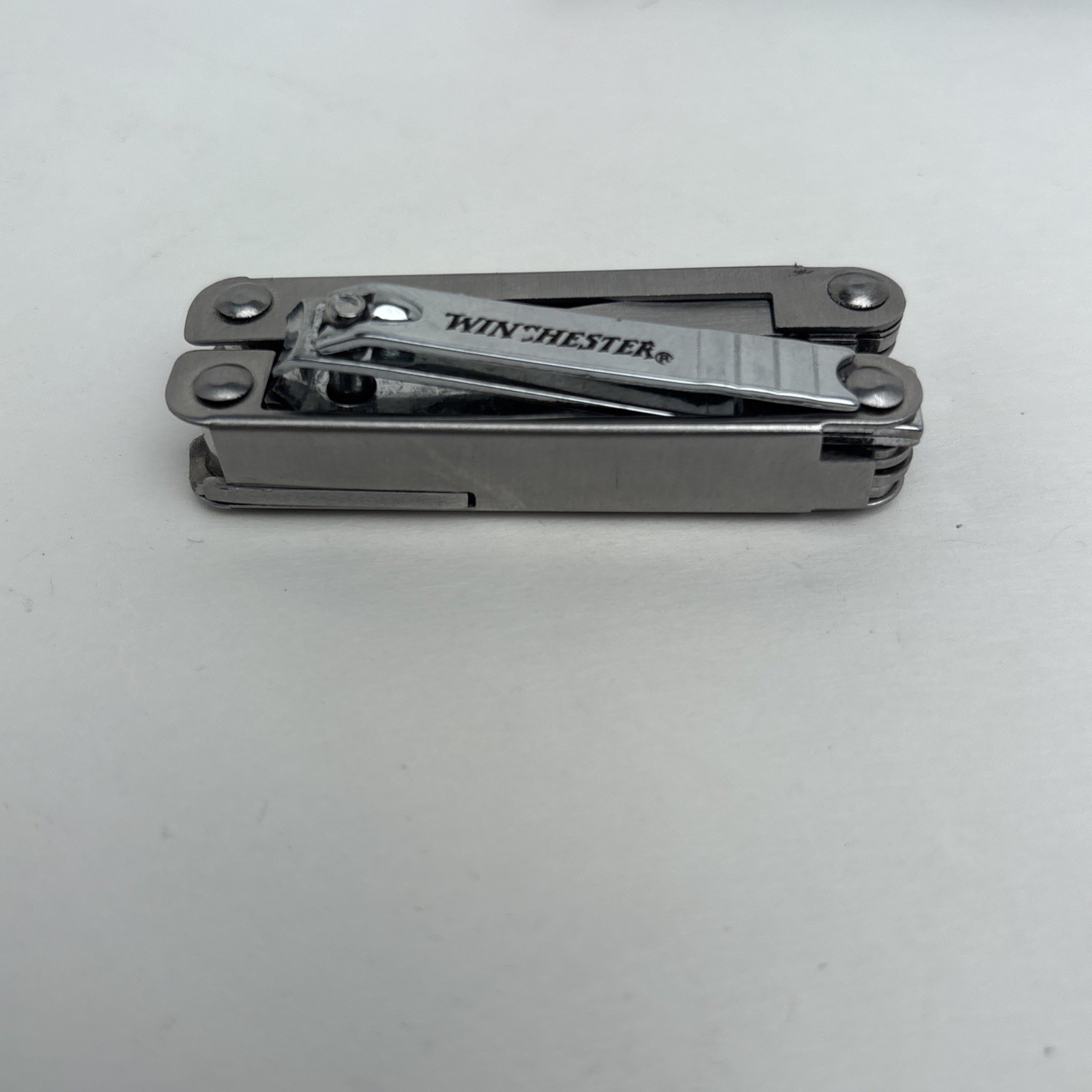 Lot Of 4 Different Function Multi-Tools Winchester Nail Clipper & Wood Grain