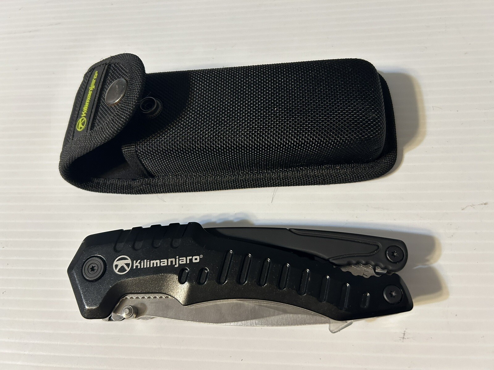 Kilimanjaro Magnus 9-in-1 XL Multi-Tool Folding with Snap Pouch New Never Used.