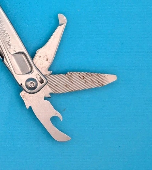 Leatherman Rev 3.8″ Multi-Tool, Stainless! *SOME RUST ON ITEM*