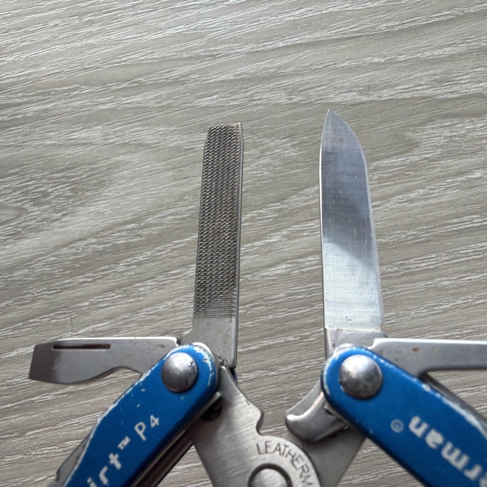Leatherman Squirt P4 MultiTool Plier Knife File Drivers Blue Metallic