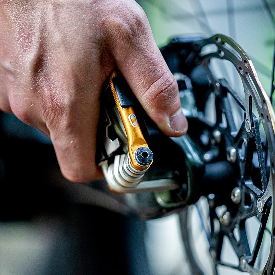 Standard Gold Multitool with Hex Wrenches Screwdrivers and Chain Tool