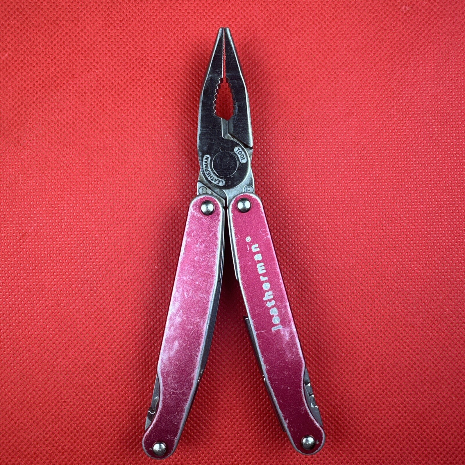 Retired Pat. Pending Gen 1 Red Leatherman Juice C2 Multitool. Great EDC!