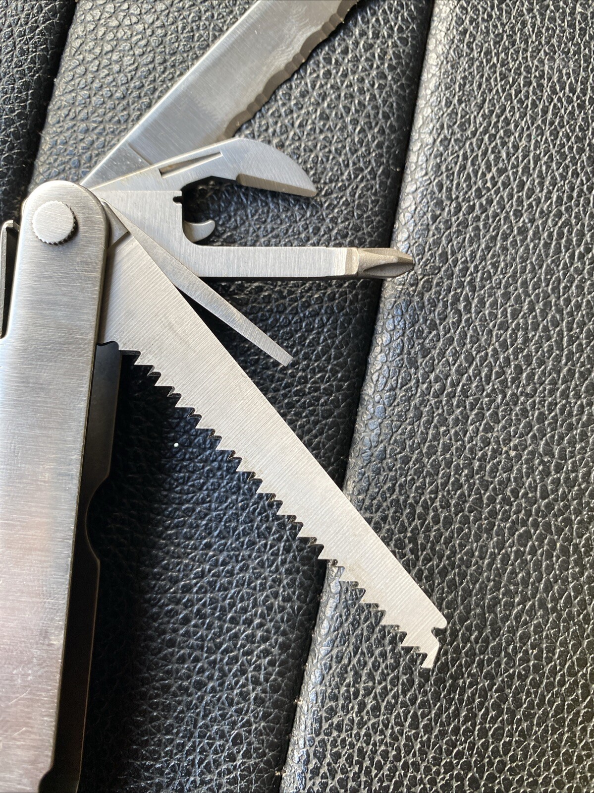 Multi-tool With Pocket Clip. Leatherman 832127 Rev Stainless Steel