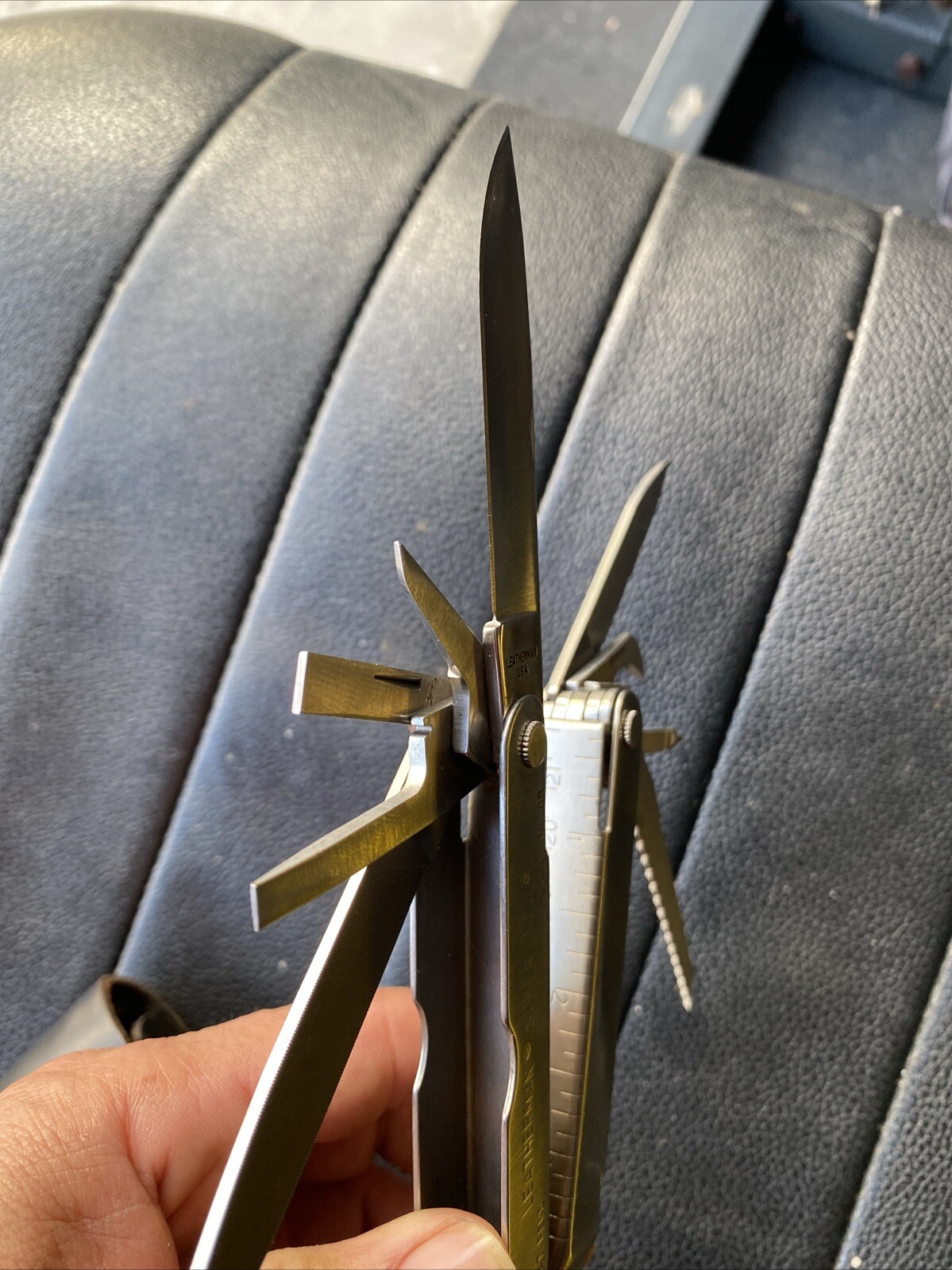 Multi-tool With Pocket Clip. Leatherman 832127 Rev Stainless Steel