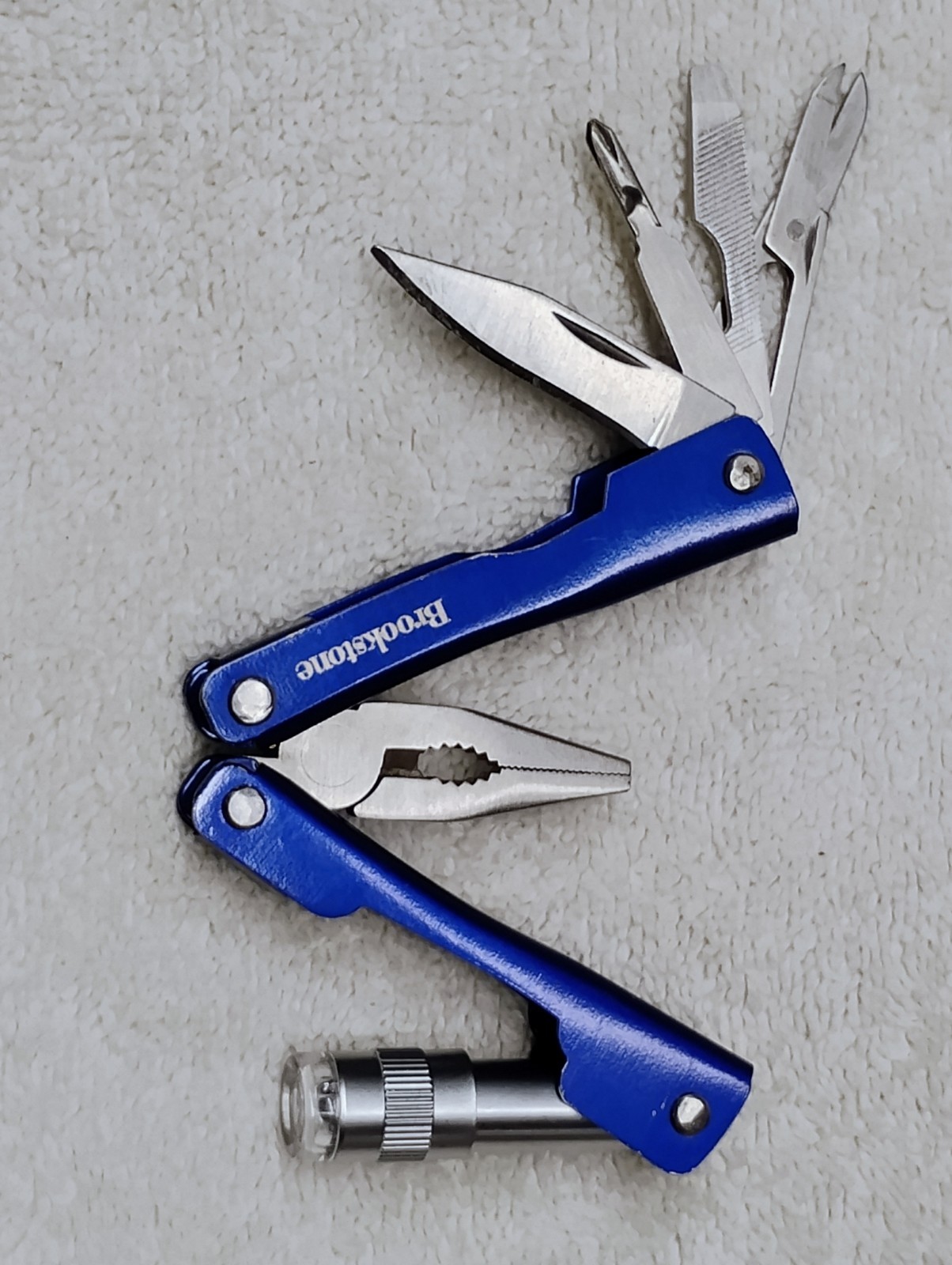 Brookstone Pocket Knife Multi 7+ Function Tool Led Light Key Compact Mini Pliers