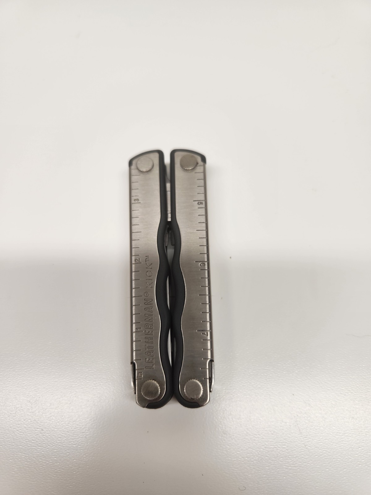 Leatherman Kick Stainless Steel Multi-Tool with Black Sheath Retired Very Good