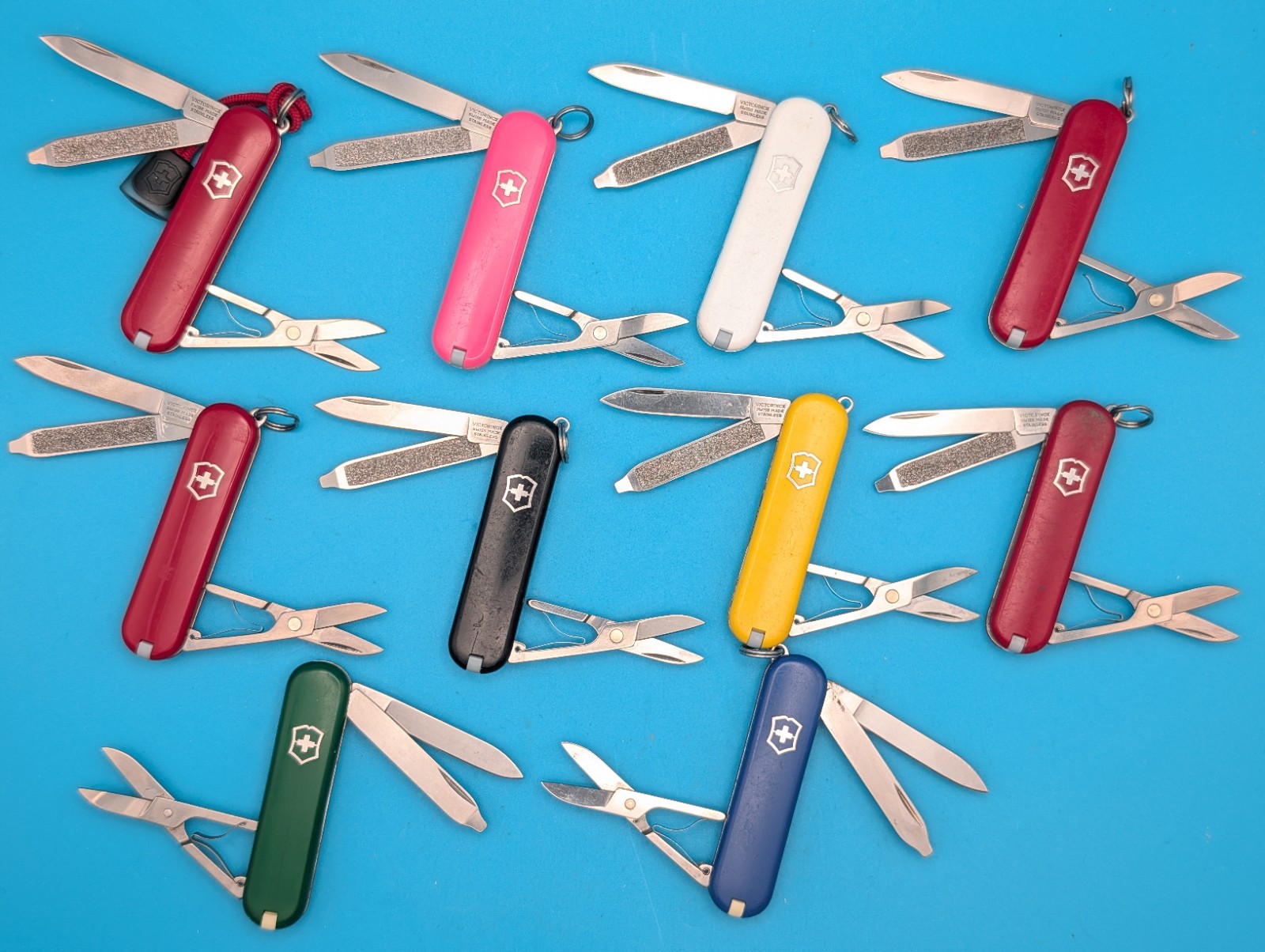 Lot of 10 Victorinox Classic Swiss Army Knife Multi Tools!