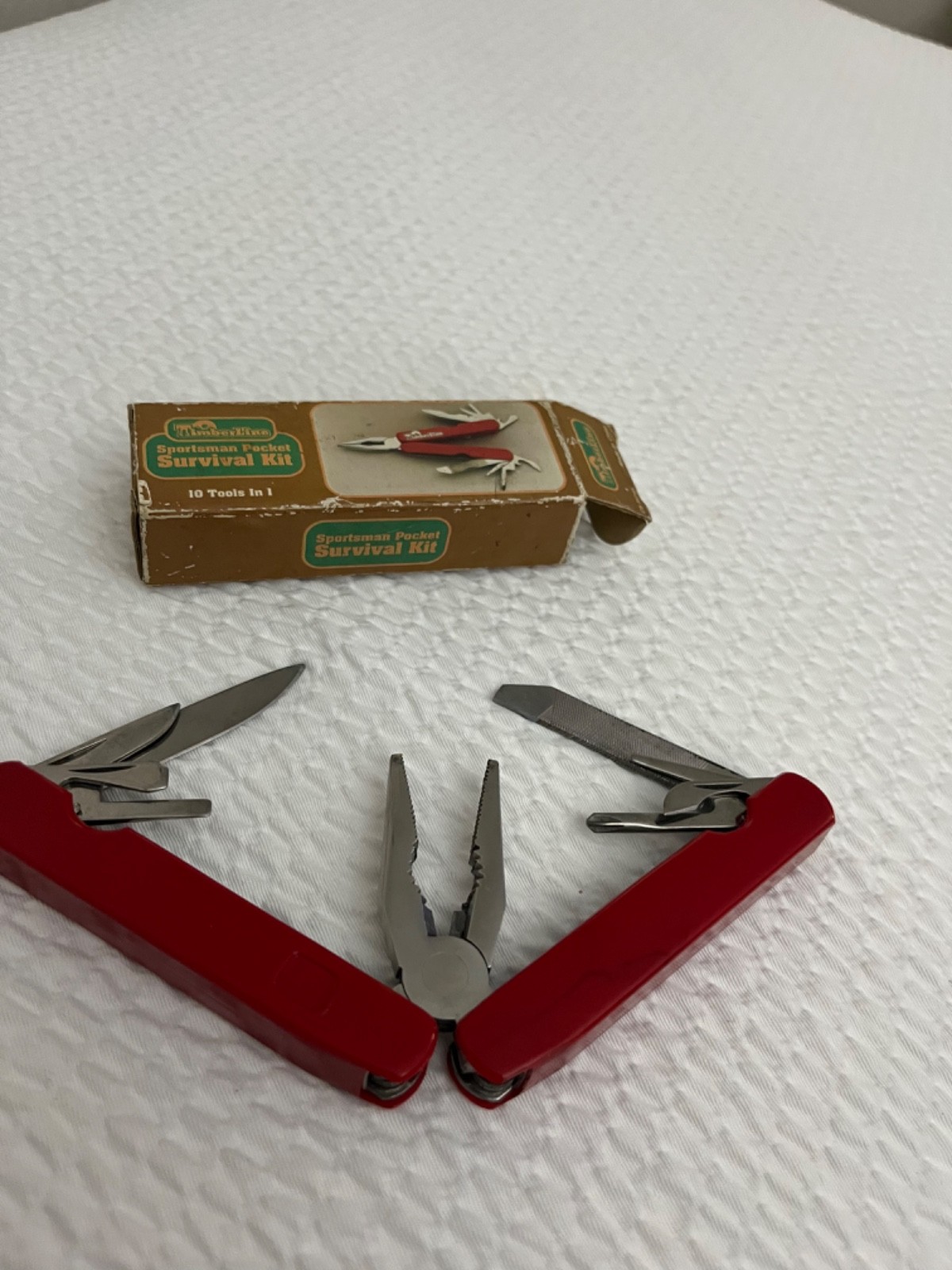 vintage Timberline Sportsman Pocket Survival Kit multi-tool in red