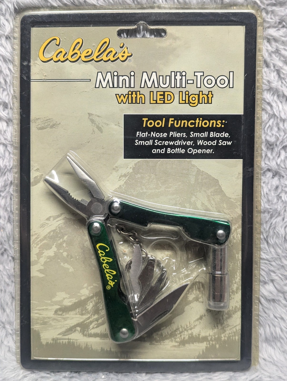 Cabela’s Mini Multi-Tool with LED Light, Keychain and Nylon Sheath – Unopened