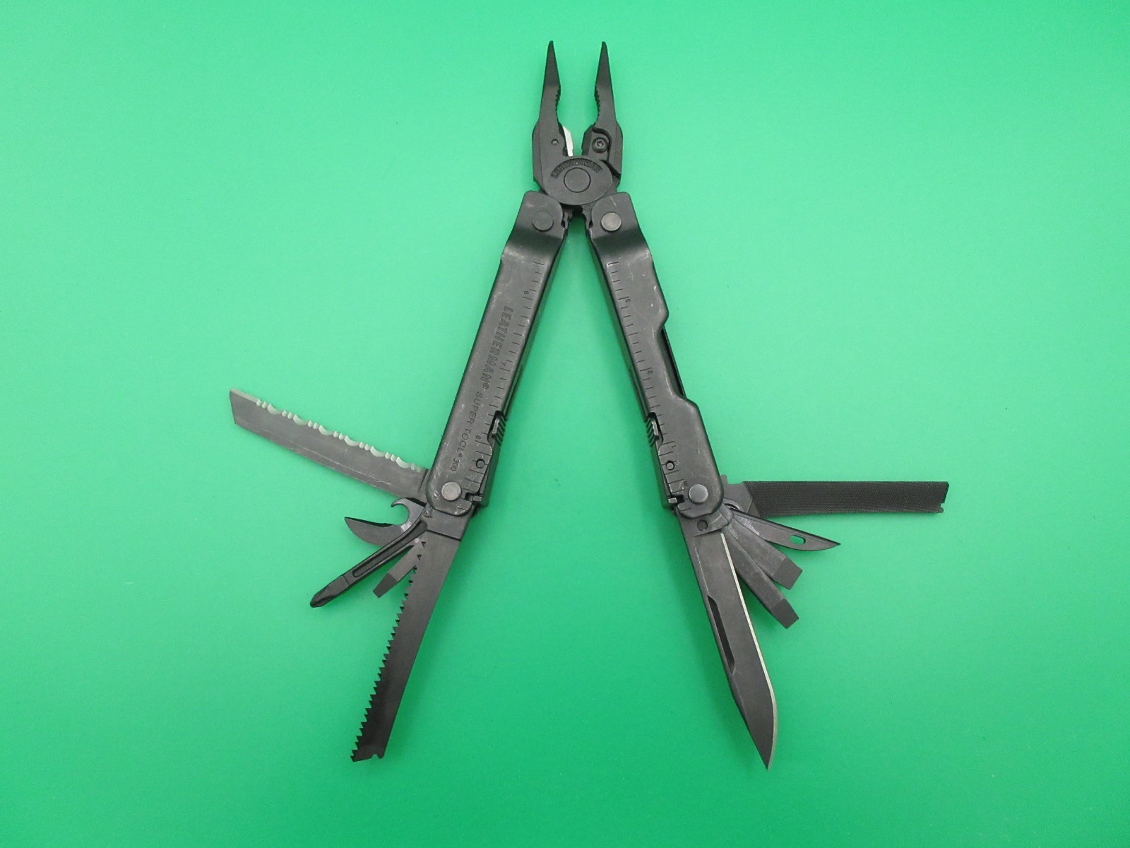Leatherman Super Tool 300 Black Oxide Folding Multi Tool Knife Saw #60A