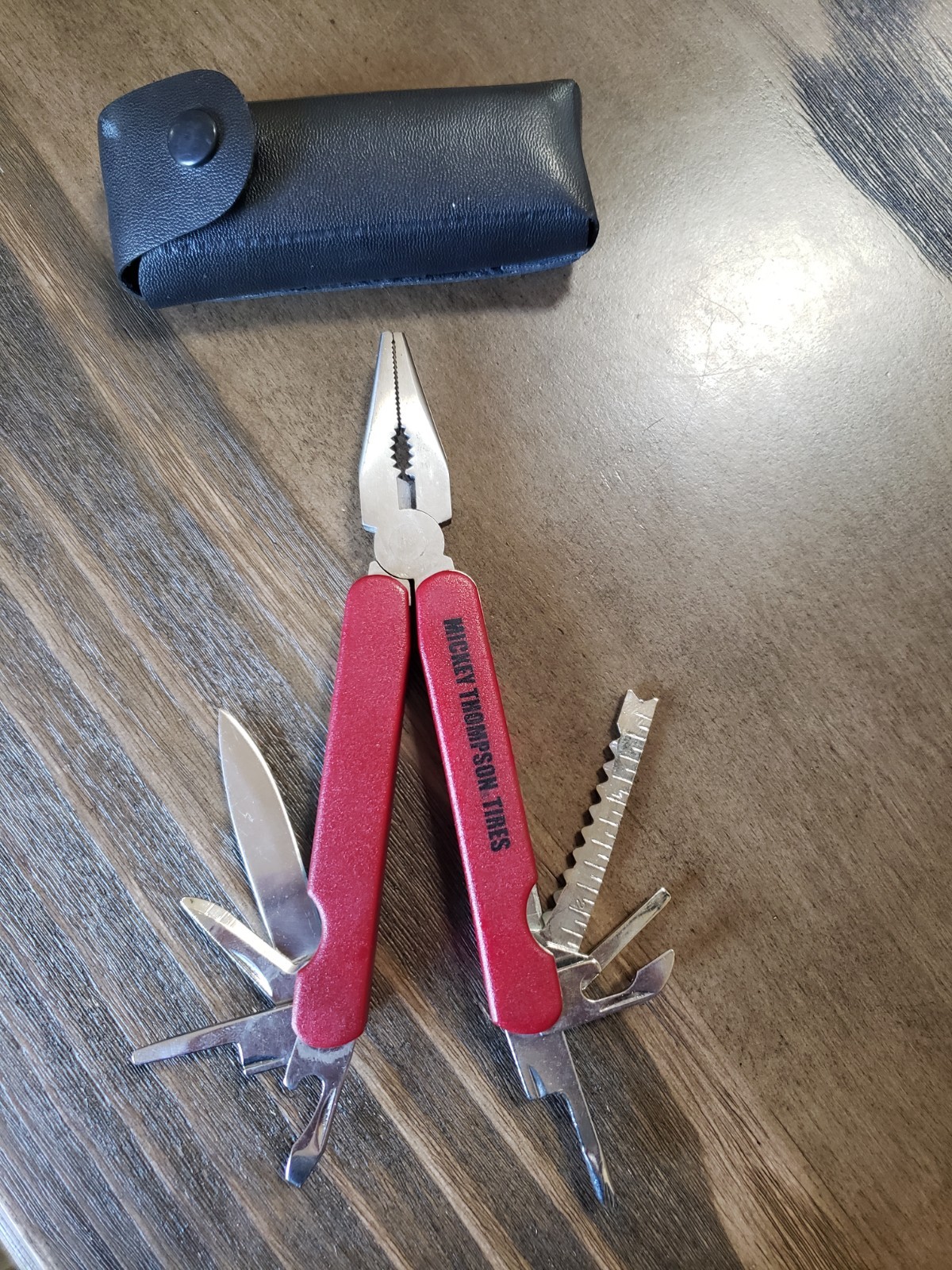 VINTAGE MICKEY THOMPSON TIRES BRANDED MULTI TOOL WITH CASE PLIERS KNIFE