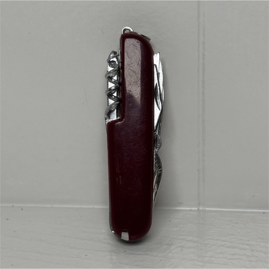 Red Swiss Army Knife With 12 Attachments Including Scissors, Saw, Etc