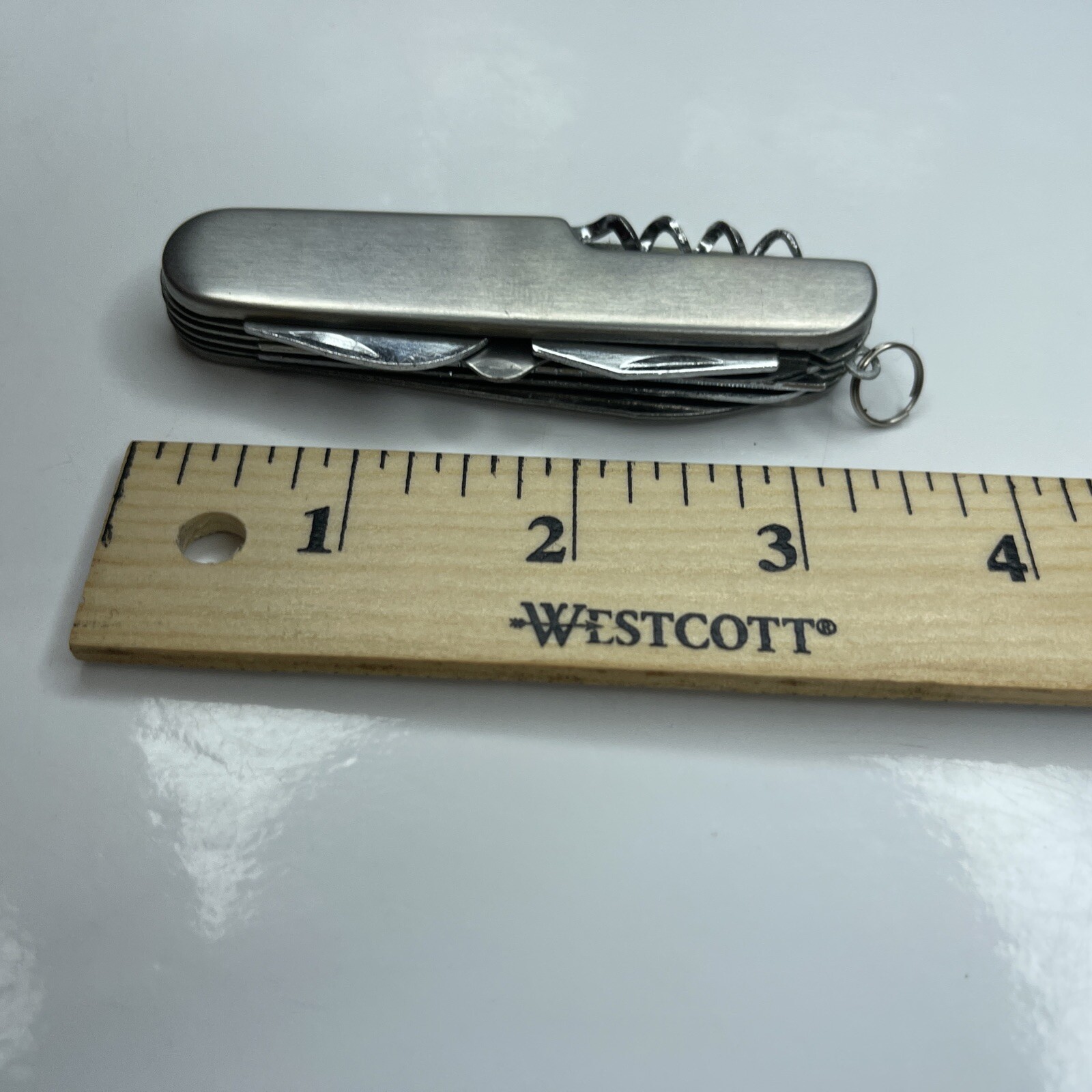 A Silver Tone Folding Utility Pocket Army Knife Stainless Scissors Cork Opener