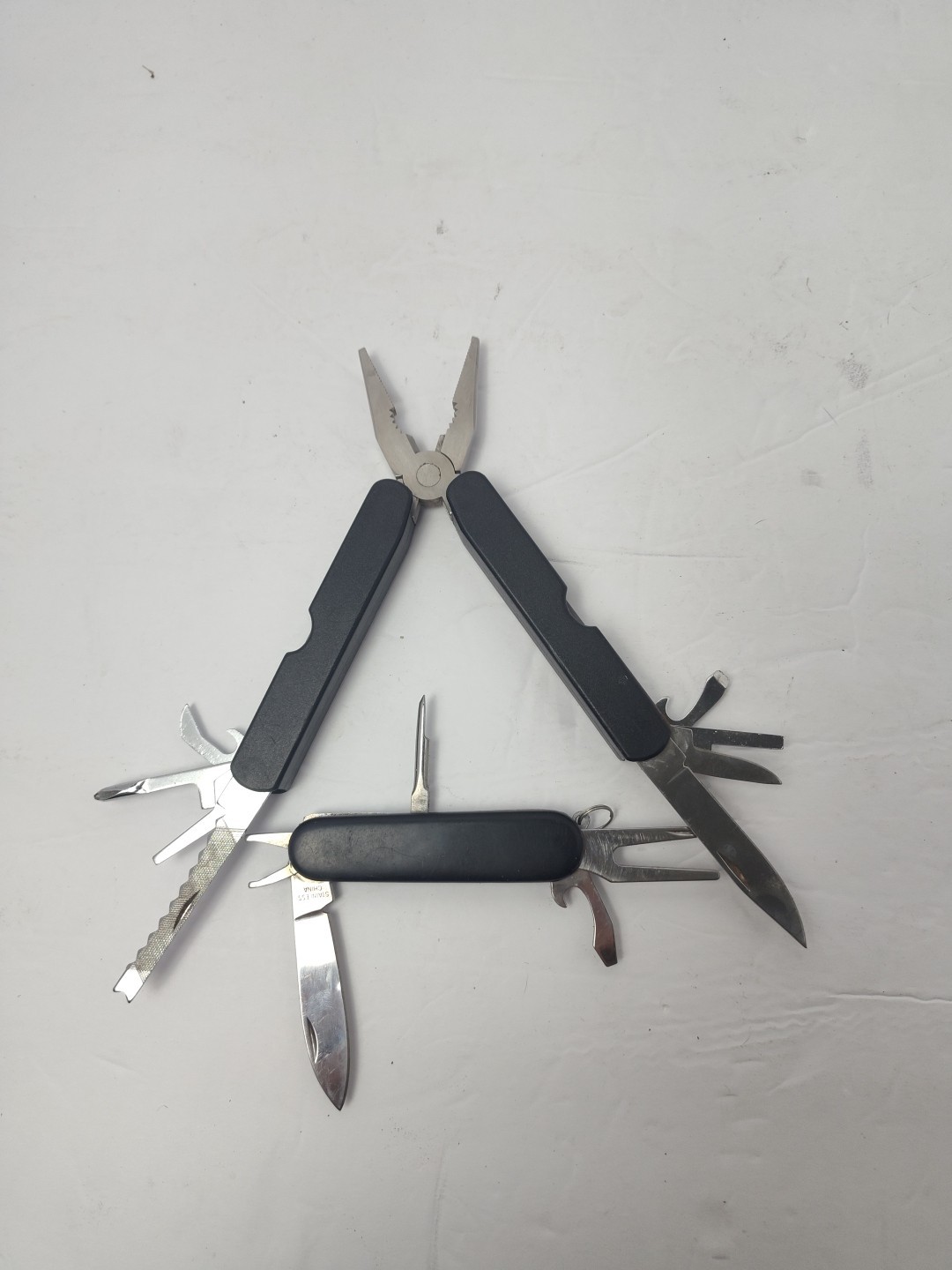 Multitool Stainless Steel Pliers W/ Black Handle And Multitool Pocketknife Black