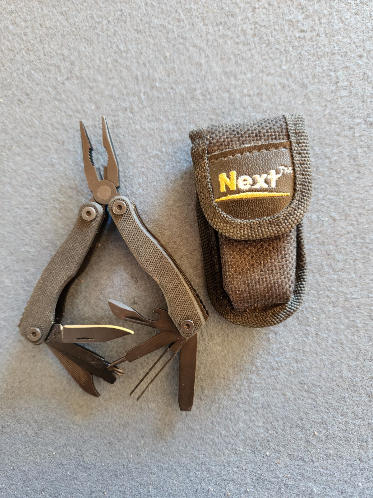 Multi Tool Pliers, Wire Cutter, Saw, Knife, tweezer, Black 10 tools, unused
