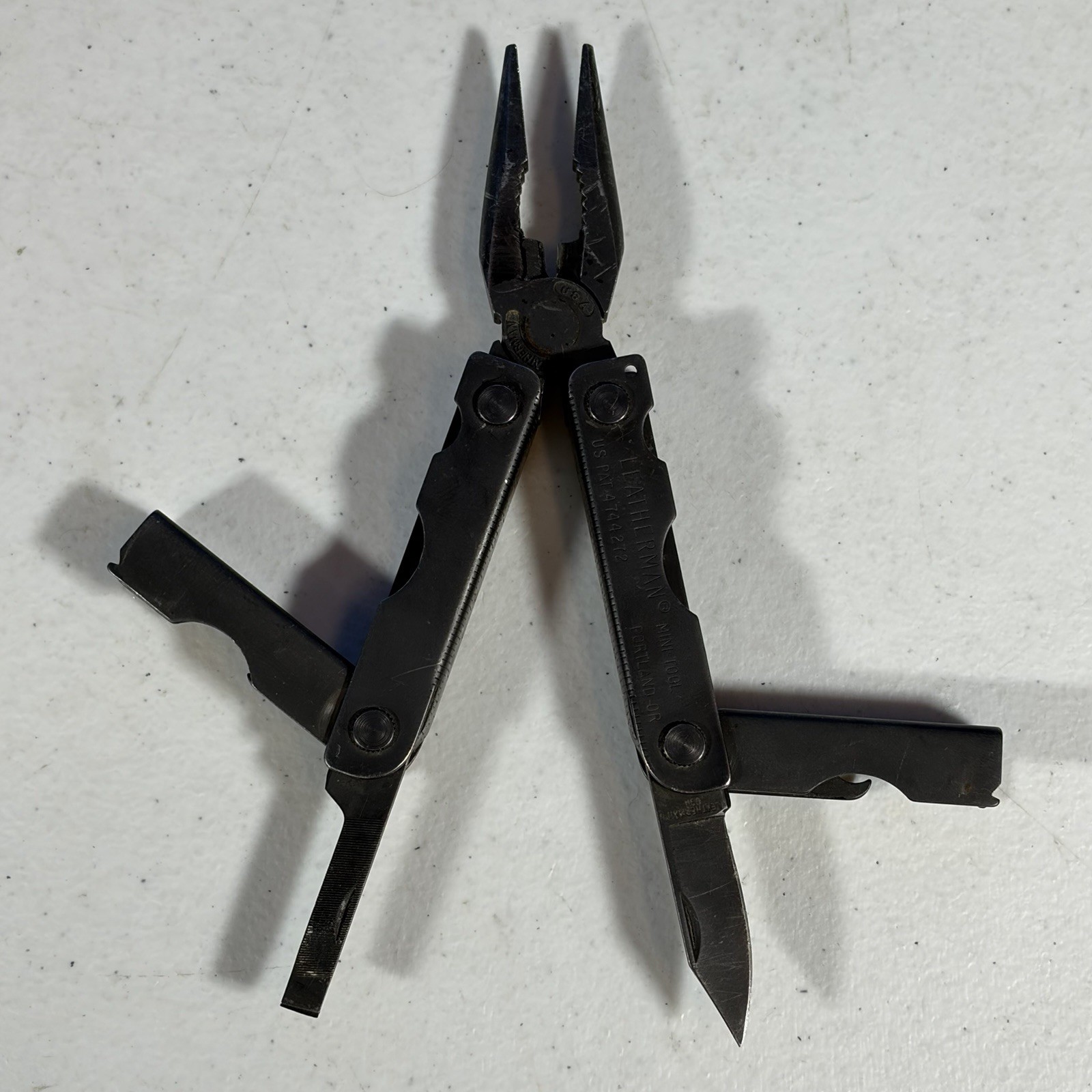 Leatherman Black MINI TOOL Black Multi Tool W/ Sheath