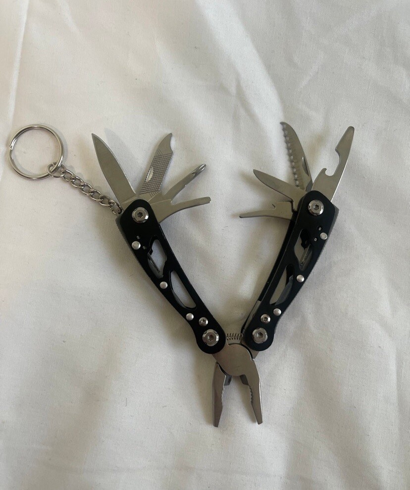 Pocket Size Multitool with Spring-Action Pliers and Saw,