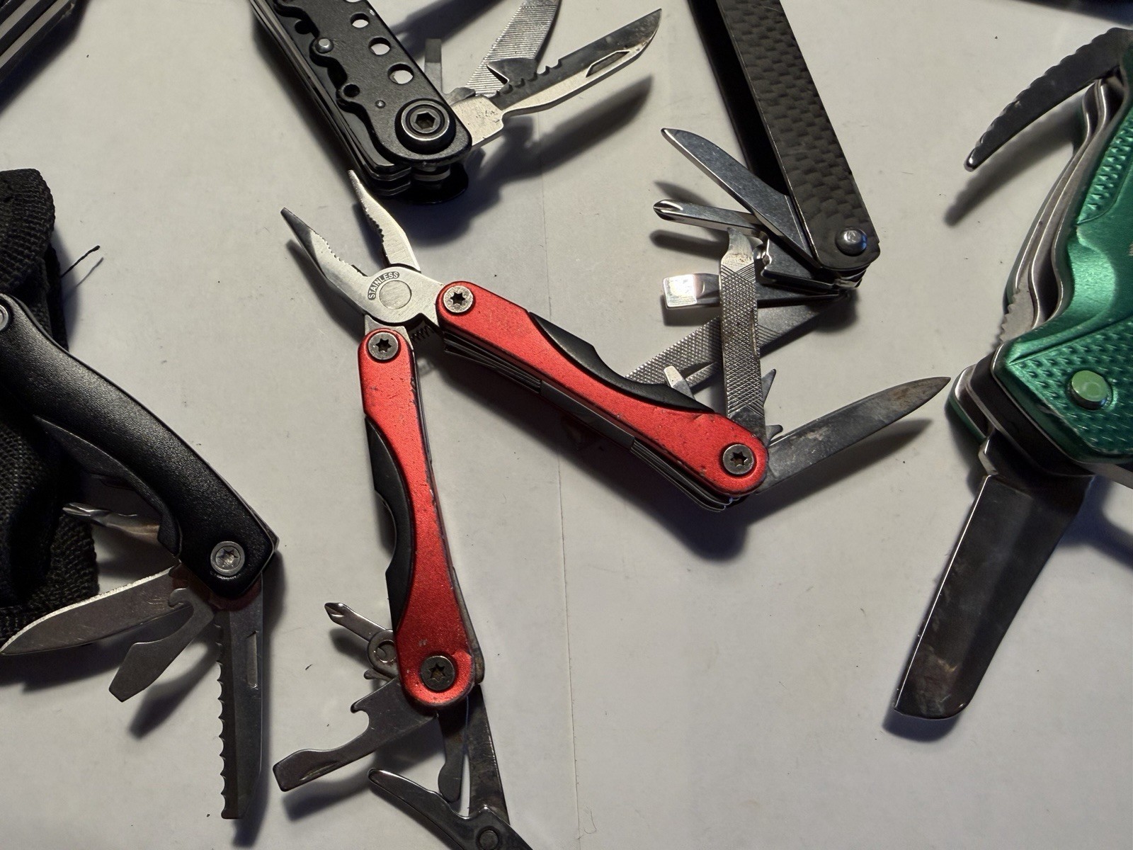 Great Deal! Lot Of 7 Multi Tools Electricians Pliers Cork Screw Blade File Etc