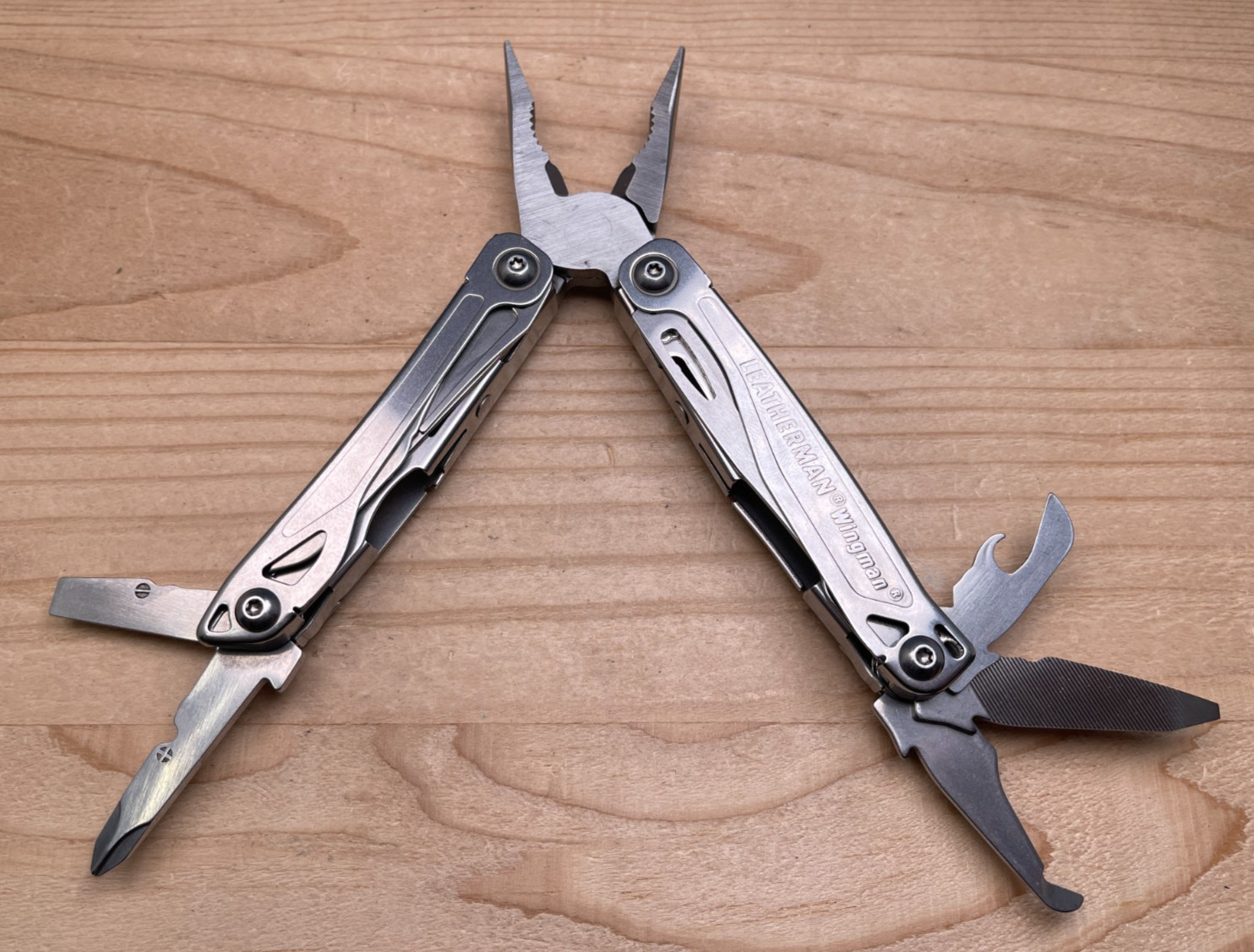Leatherman Wingman Multi-Tool Knife 12/15 – Stainless Steel, Pocket Clip