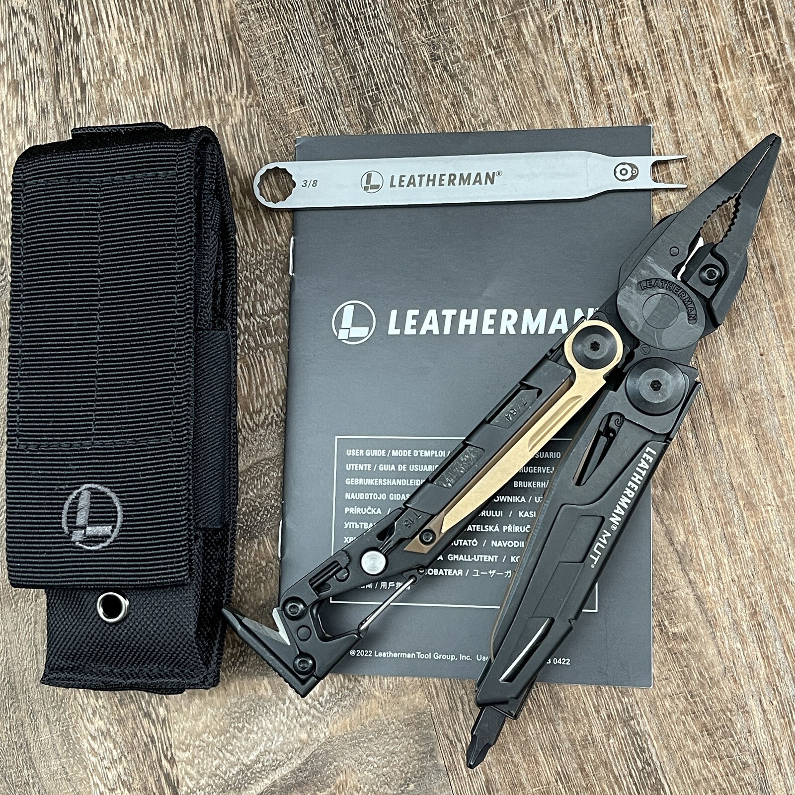 Leatherman MUT Black multi tool, black molle sheath. New without retail box
